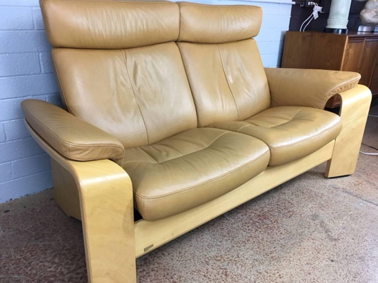 Superb leather reclining sofa from the stressless line from Ekornes. Leather is in excellent condition. No rips, tears, spots, or visible wear.