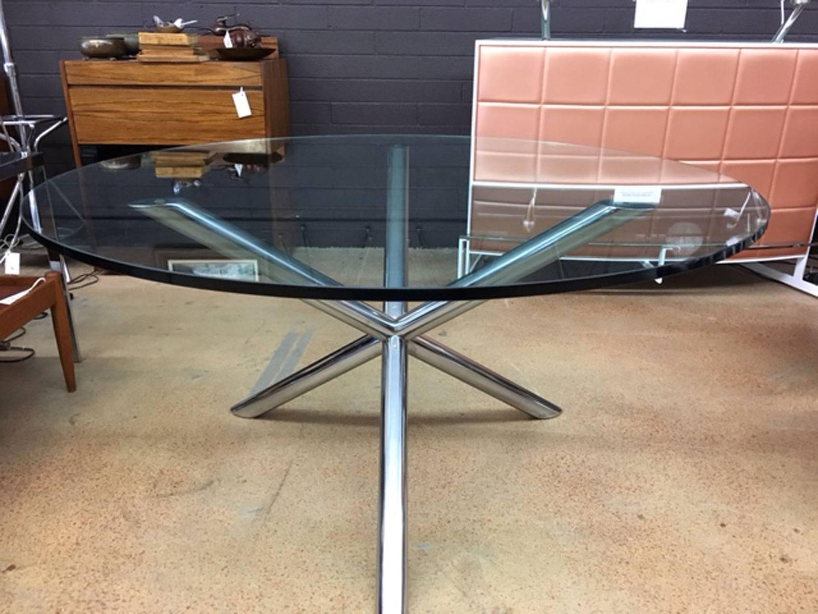 Jax dining table with heavy glass in the style of Milo Baughman. Truly nice table with an artistic Jax presentation.