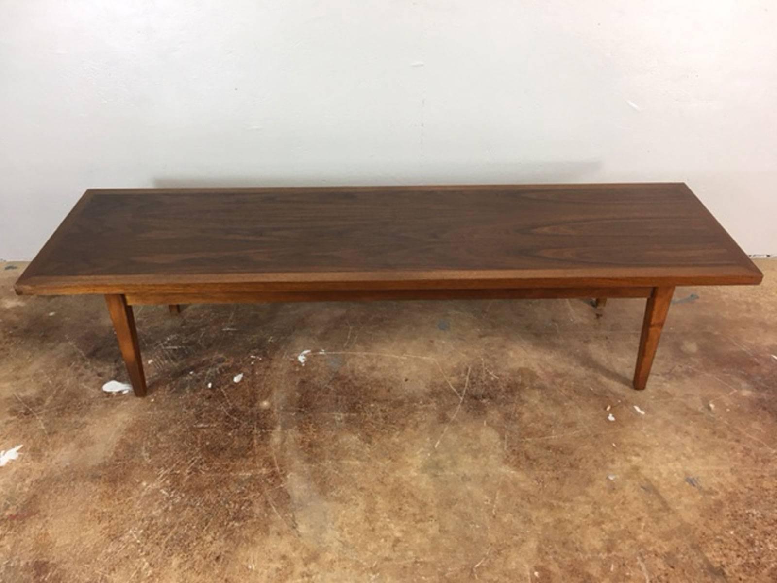 Simple straight lines but sophisticated 1960s walnut coffee table.