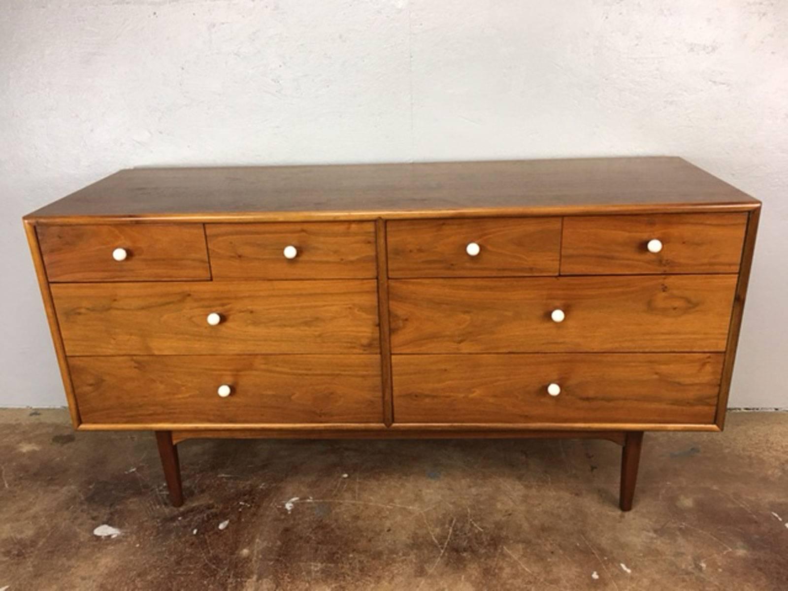 Eight-drawer dresser by Kipp Stewart for Drexel. All original. Walnut. 

Note only one life wear particular to point out. Included is a picture showing a less than dime sized finish blemish. Not very noticeable. If the purchaser desires this