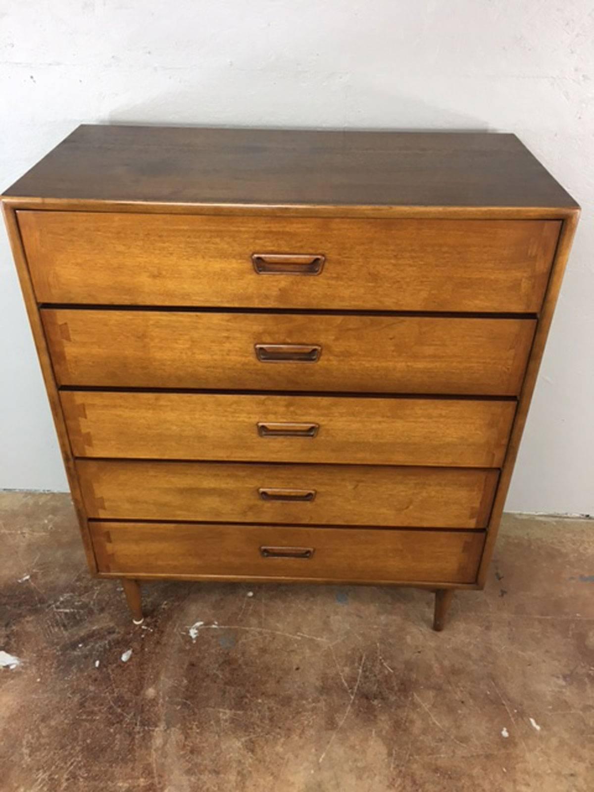 Five drawer-dresser by Lane Altavista in walnut.