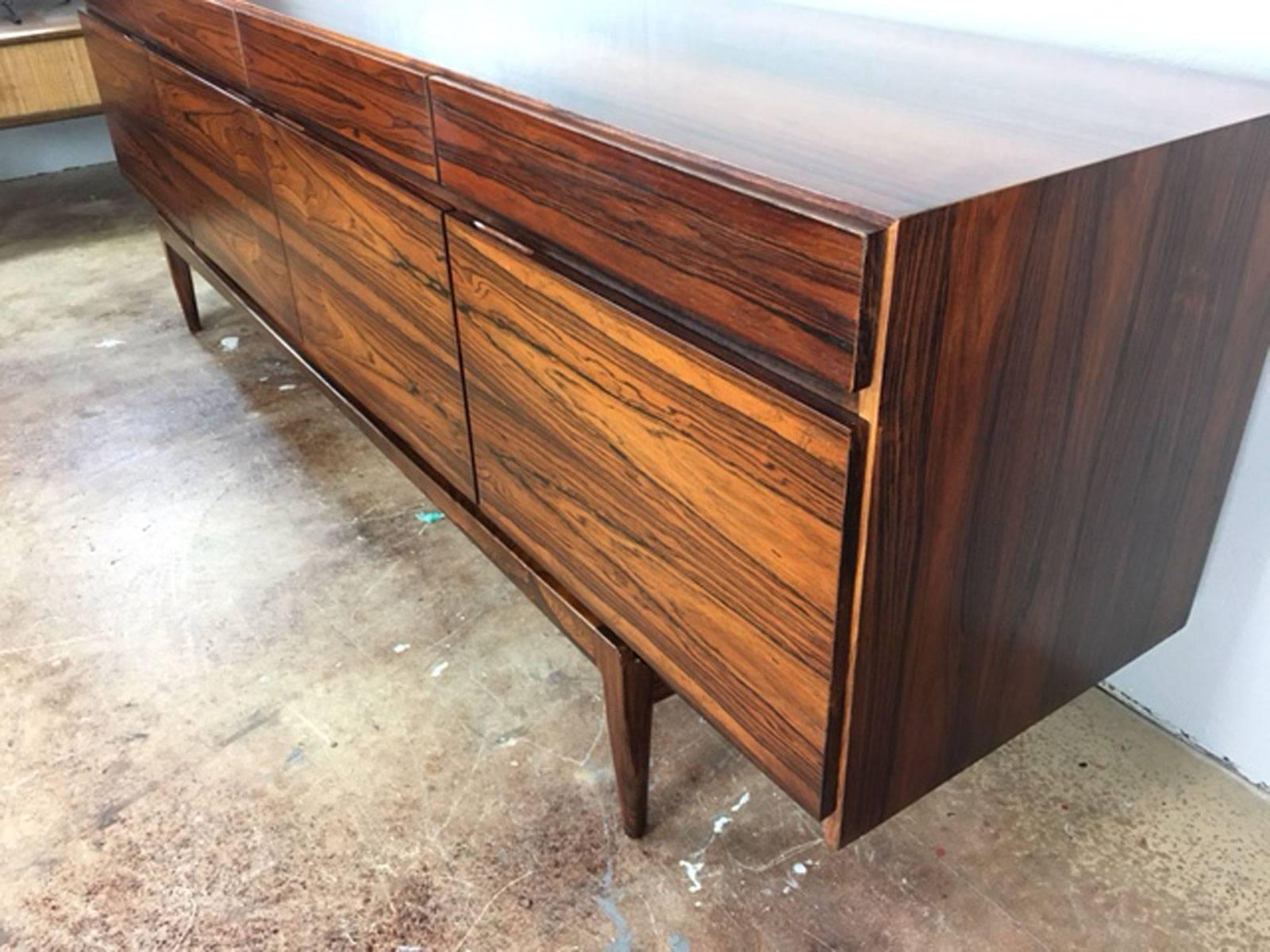 Rosewood sideboard FA66 designed by Ib Kofod-Larsen for Faarup Møbelfabrik, circa 1960s. Original overall very good condition with minor wear. Sharp.