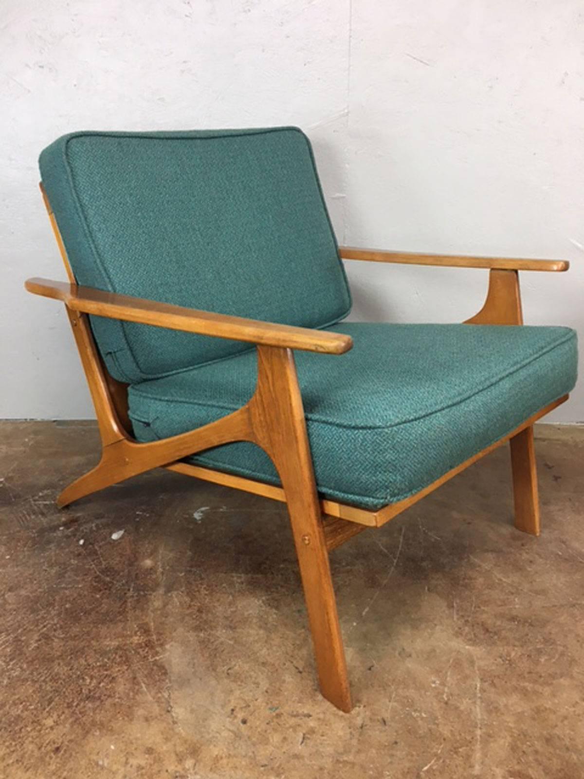 Pair of early Danish lounge chairs. Newer fabric. No rips, holes, tears or unusual wear. Overall good condition. Wood is in original condition.