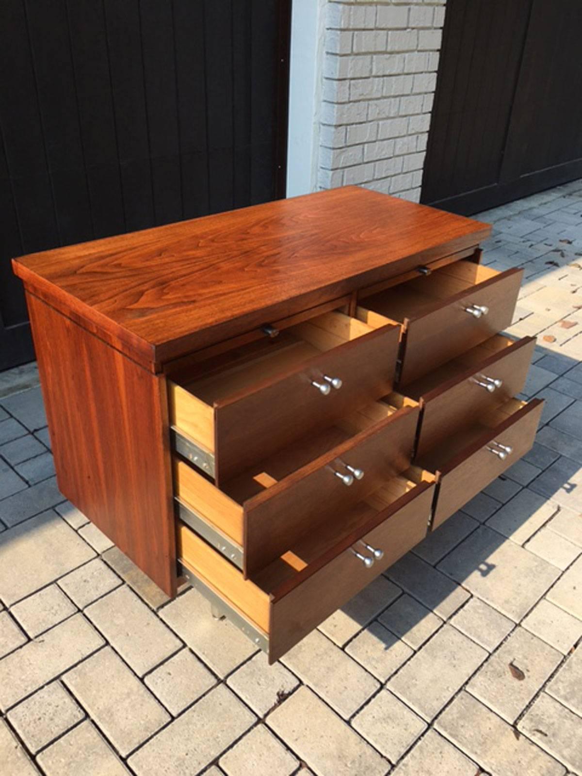 Lehigh Leopold mid size office credenza cabinet with brushed steel pulls and stainless steel legs in walnut. Mildly restored. Solid. Very well build piece. Drawers are unlocked but no keys. Easily made.