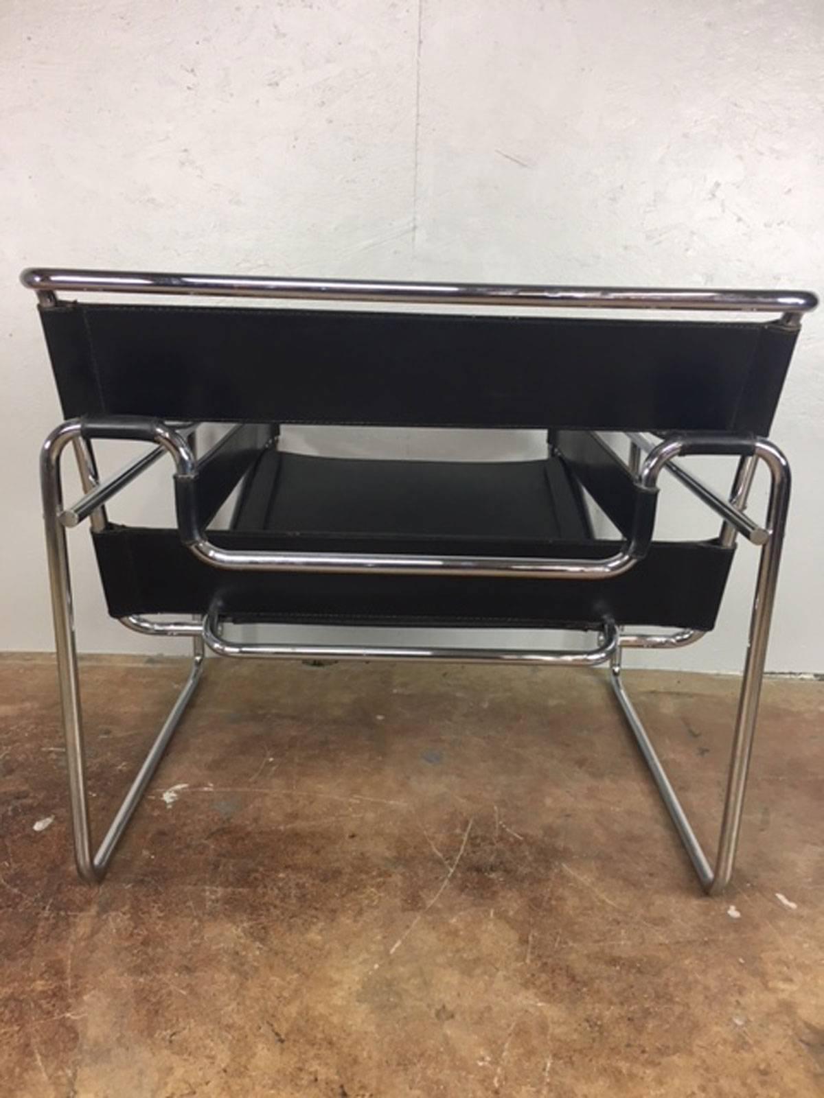 Authentic Marcel Breuer designed Wassily chair made in Italy for Stendig. 

Chrome tube construction with the authentic chrome tube ends. Black belting leather straps are in excellent condition. Tight and taut. Stendig label on bottom. 

Seat