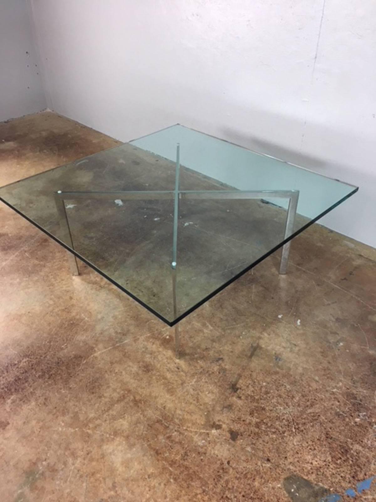 Stylish Milo Baughman square glass and chrome base coffee table. Chrome base is in very good condition and this table is excellent overall. 3/4