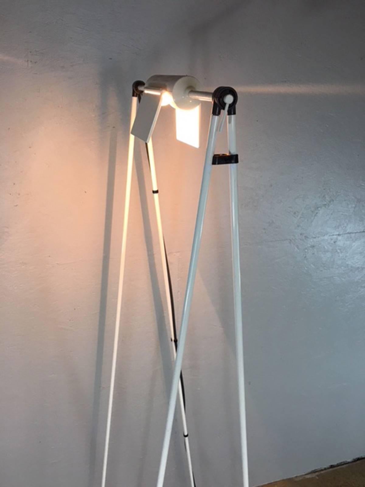 Unique Mid-Century Modern A-frame floor lamp with slider dimmer floor tap switch.