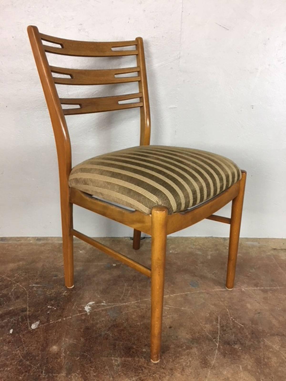 Set of four upholstered walnut dining chairs and table with one leaf by Falstrup of Denmark. Table is 43