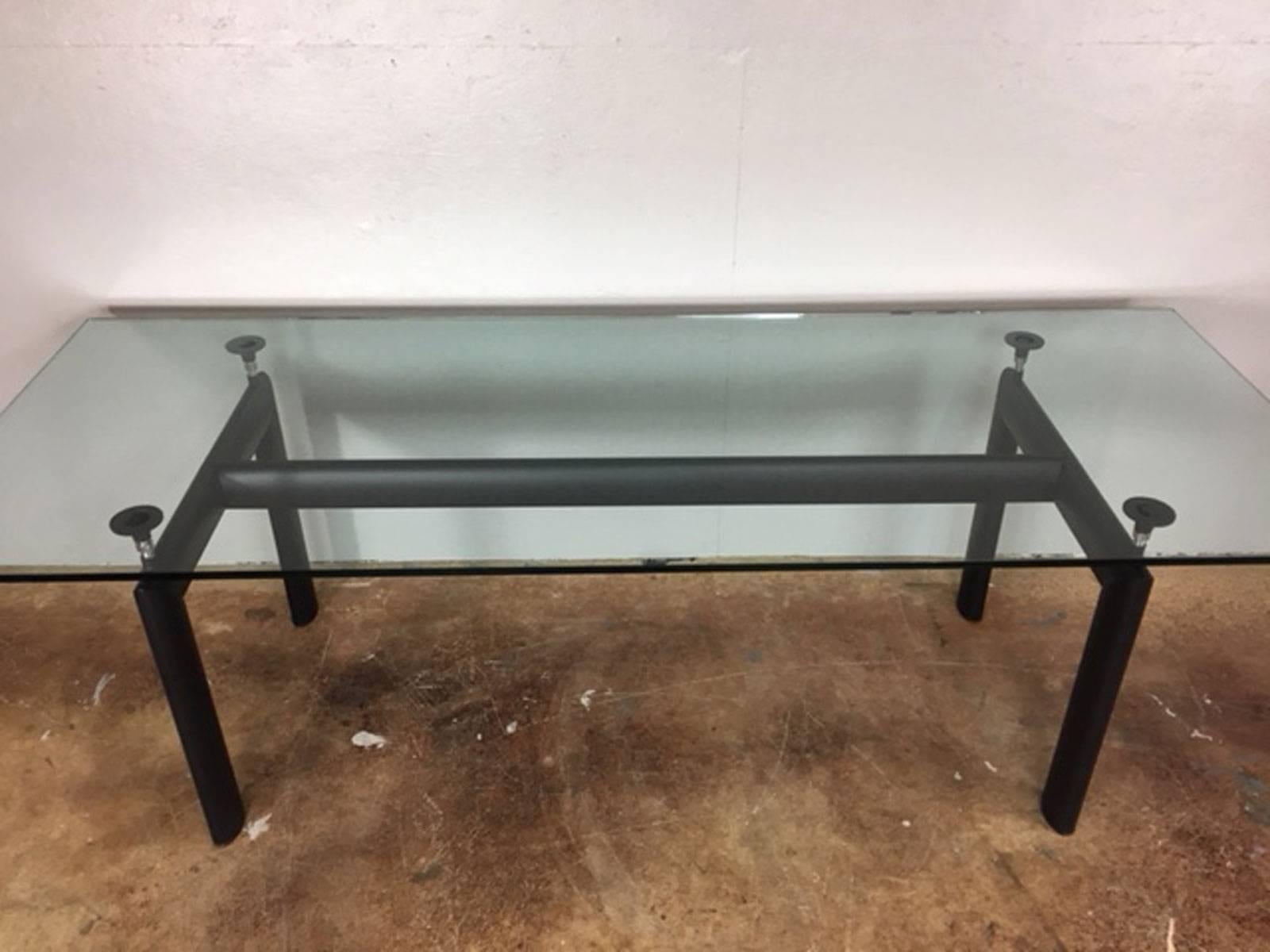 Cassina manufactured modern glass and steel designed by Le Corbusier. Table is signed. Superb condition.