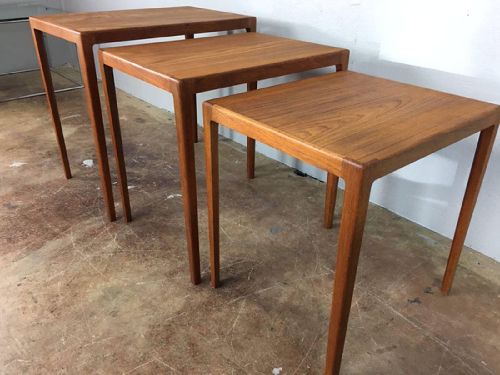 Danish Architect Eske Kristensen designed these teak nesting tables and cabinet maker Ludwig Pontoppidan crafted this set. Solid teak. Extremely well done tables. Original excellent condition.