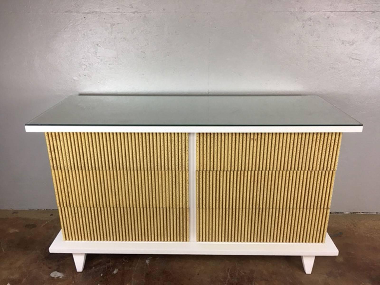 Unique American of Martinsville six-drawer dresser or credenza. Given the nature of the front drawer presentation, this piece could be utilized for either. Partially refinished for an up to date presentation. Original production color and finish