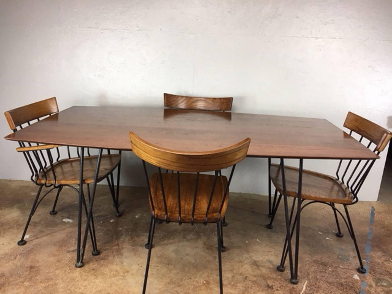 Fairly rare Russell Woodard Allegro wood and iron dining set. Stabile. Very sturdy. Simple, clean look. 

Chair dimensions are 20 inches wide x 22 inches deep x 32 inches high.