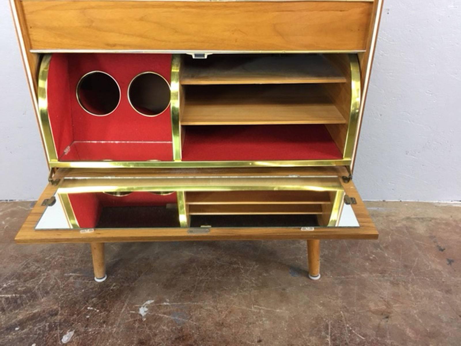 Unique stereo cabinet with built in dry bar by Koronette. Stereo and radio are in working condition, circa 1950s.