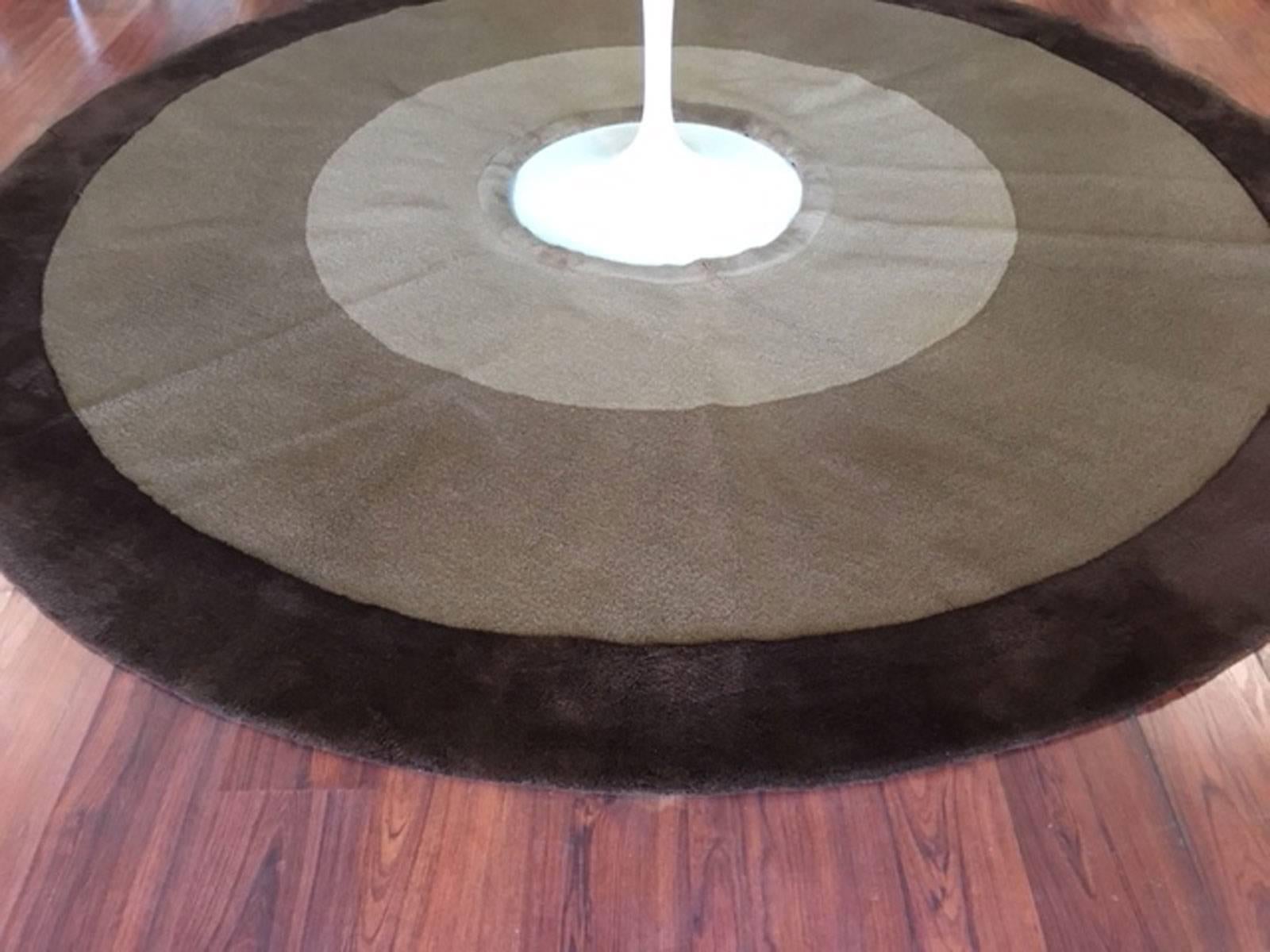 German made wool rug made explicitly for the Saarinen tulip table. Wool last forever. Overall very good condition.
