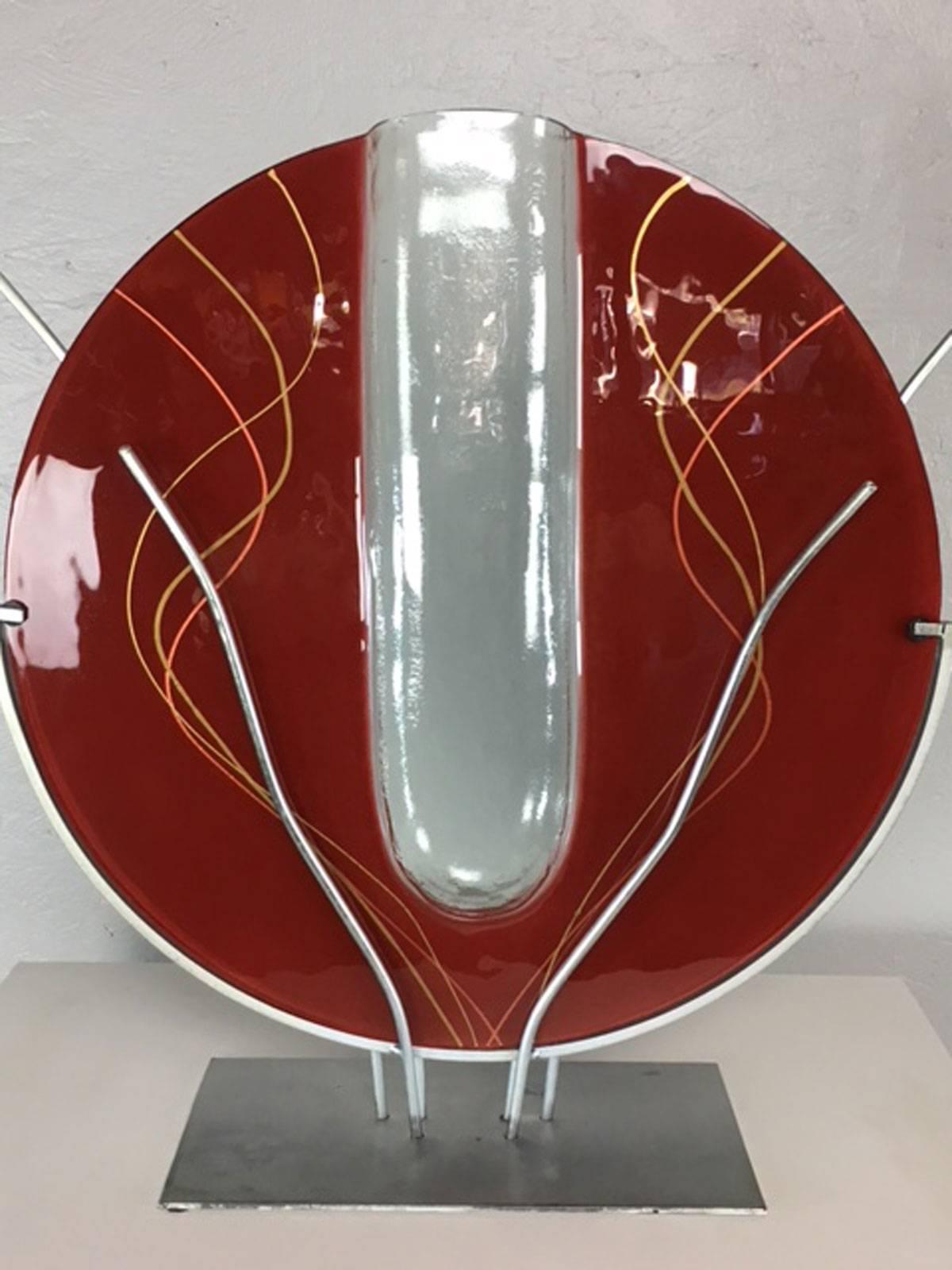 Ruby red art glass and mixed metal sculpture by Mark Hines.