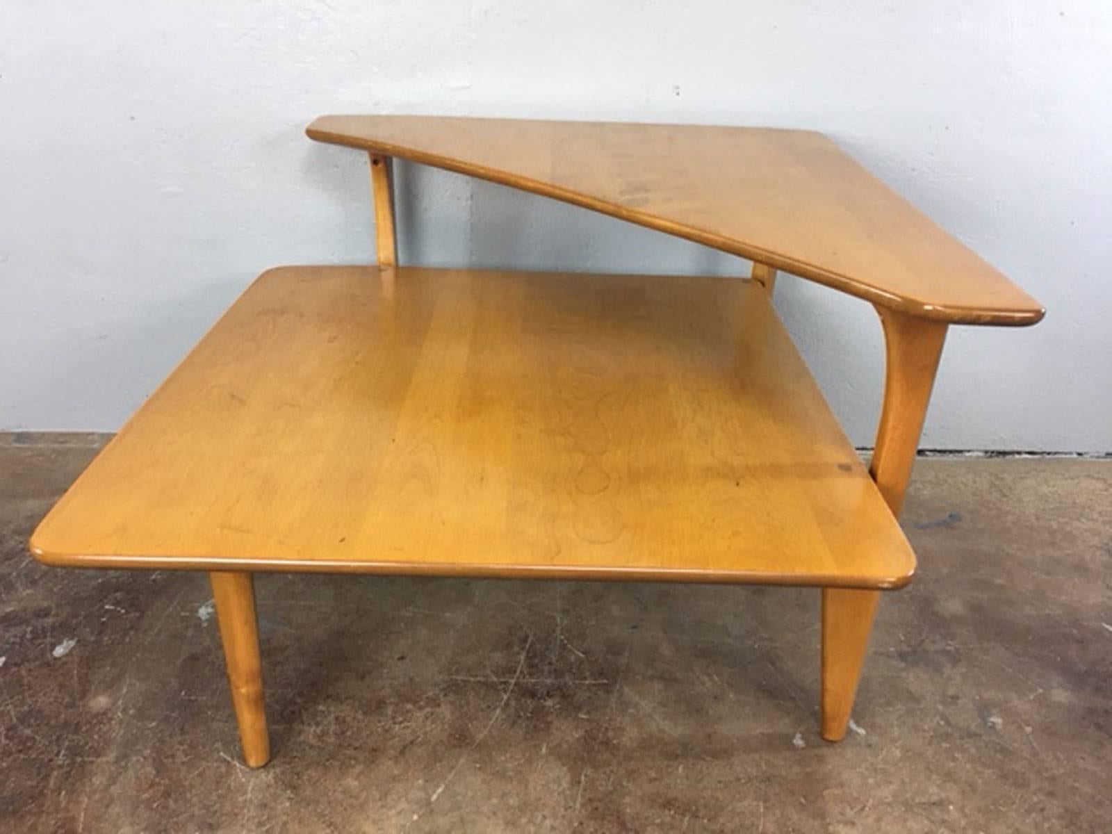 1950s solid maple wood corner table by Heywood-Wakefield. Original acquisition condition. Completely useable as is. If desire a perfect finish the solid wood of this table makes it very easy to take apart and refinish.