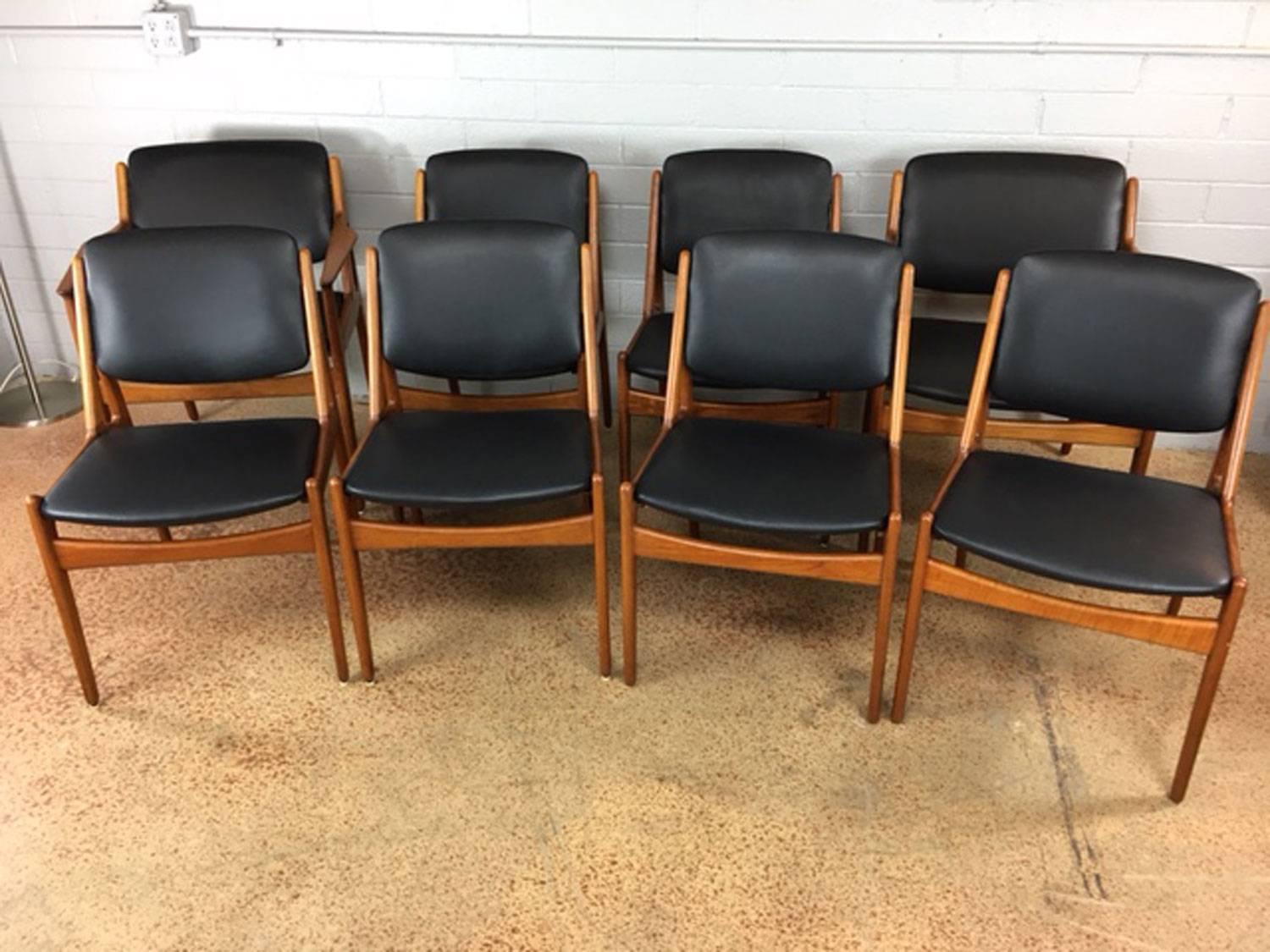 Set of eight Danish modern chairs with pivoting backs and teak frames designed by Arne Vodder. Tilt Back style. Each chair has new black leather. 

Manufactured by Vamo Sonderborg. 