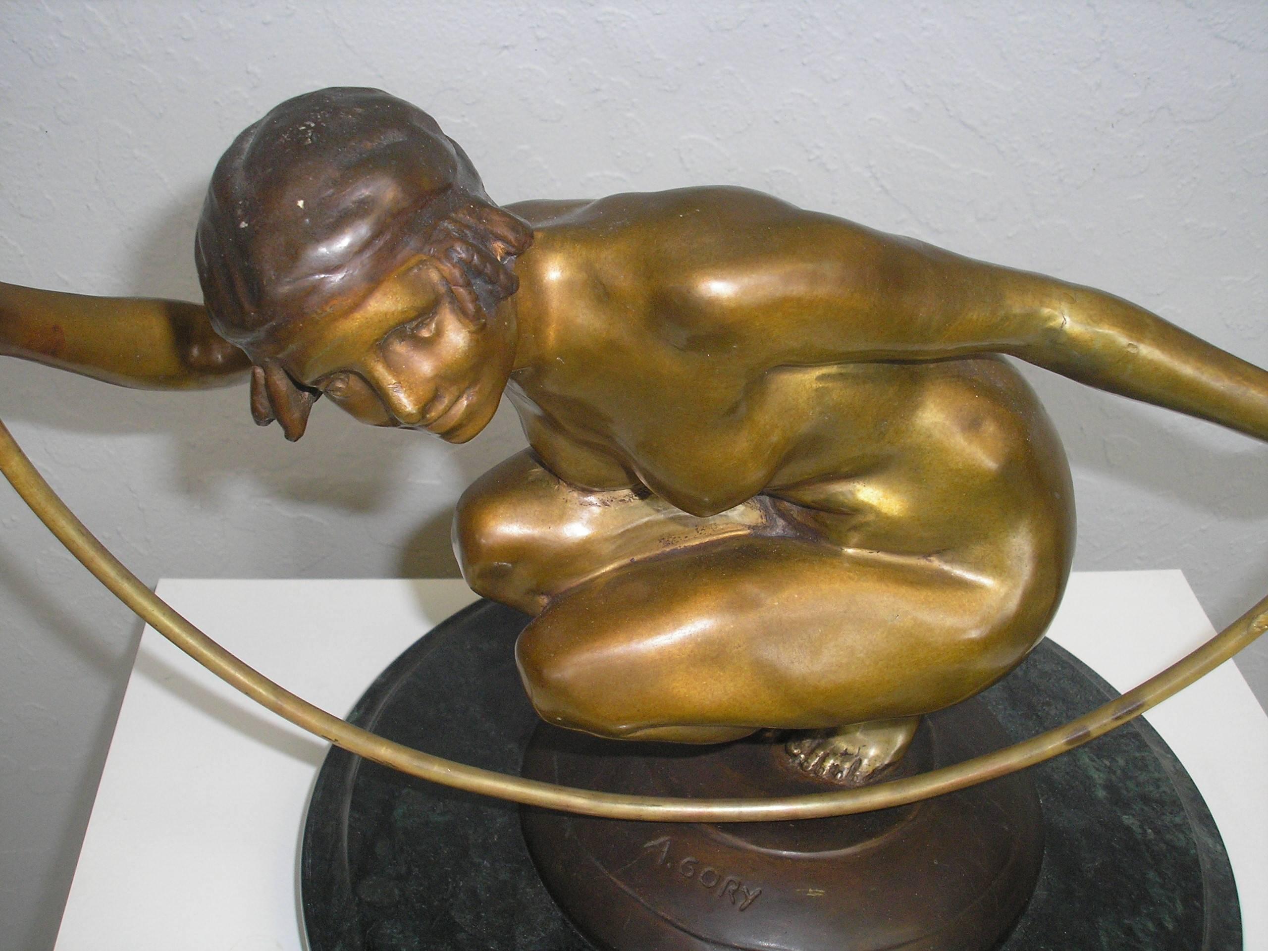 Art Deco bronze by A. Gory., circa 1920. Nude with ring. Signed on base of sculpture. Green marble base.