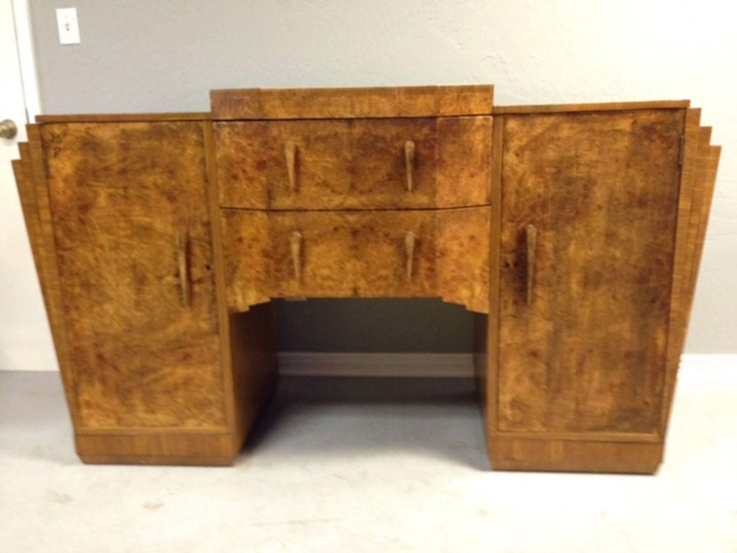 Rare Marcel Guillemard French Art Deco dining room buffet or bar. Note the bookmatch amboyna wood from the padauk tree now famous for its use on Rolls Royce and Mercedes automobile dashboards. The burl wood nature of the grain of this wood lends