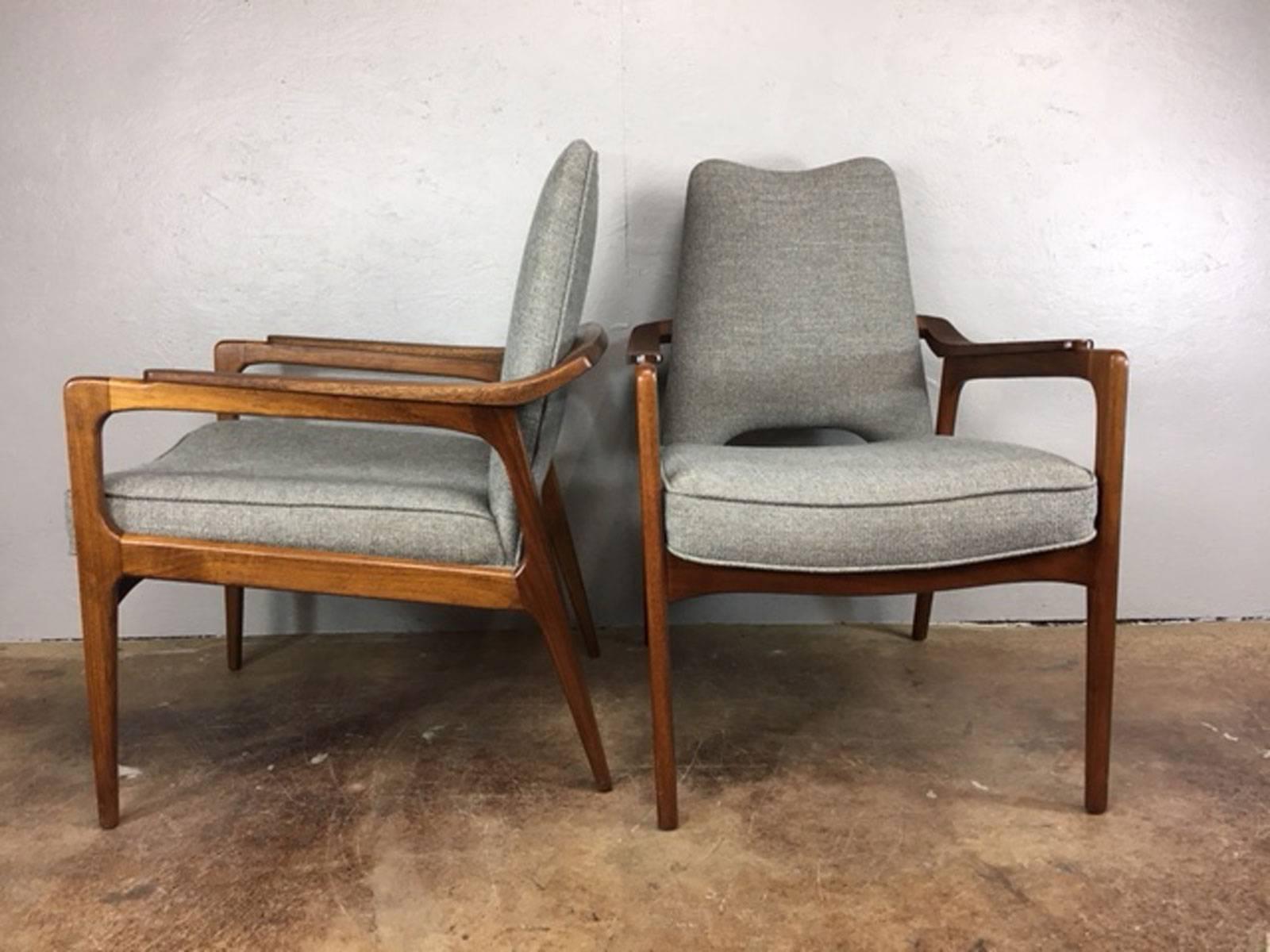 These chairs are early 1950s and are attributed to Adrian Pearsall who designed many lounge chairs in this style. The wood has been restored and is very nice.  And these chairs have also been newly reupholstered in the California 100% new polyester