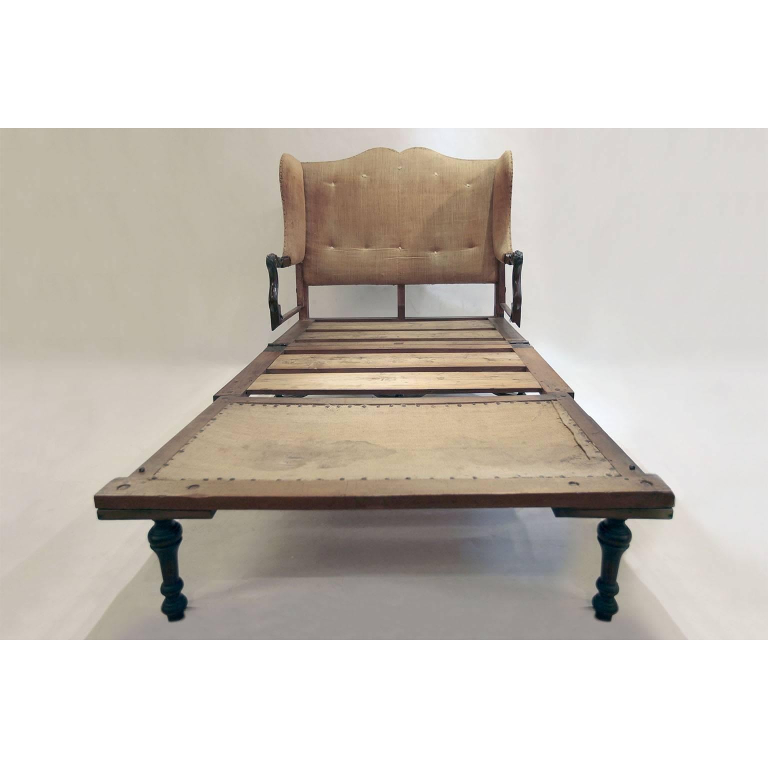 17th century Italian sofa-bed in carved walnut dark stained.
Unique for style and fold up mechanism, it is possible to turn the sofa in a bed by opening the armrest and overturning the bed net.
Authentic padding and lining.