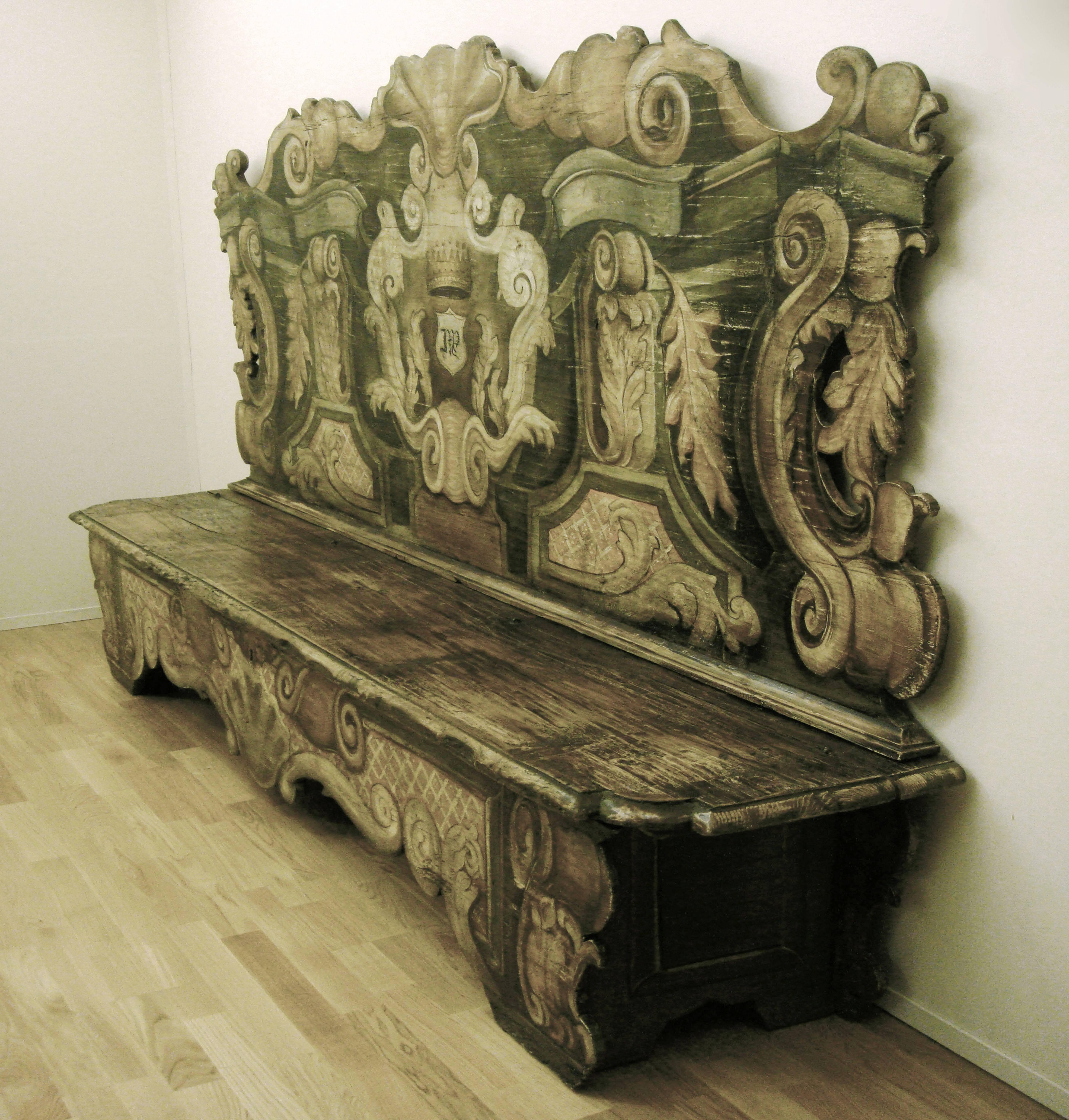 Wooden bench made up with ancient material, 18th century.