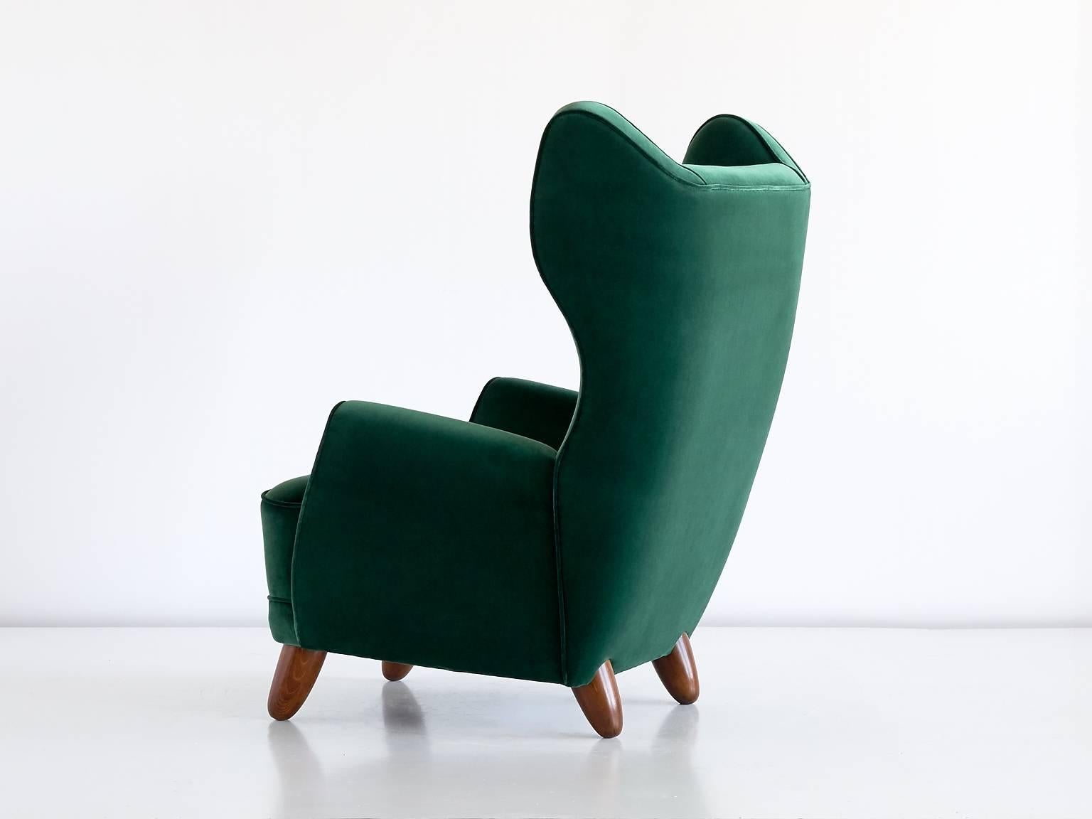 Mid-20th Century Exceptional 1940s Wingback Chair Attributed to Guglielmo Ulrich