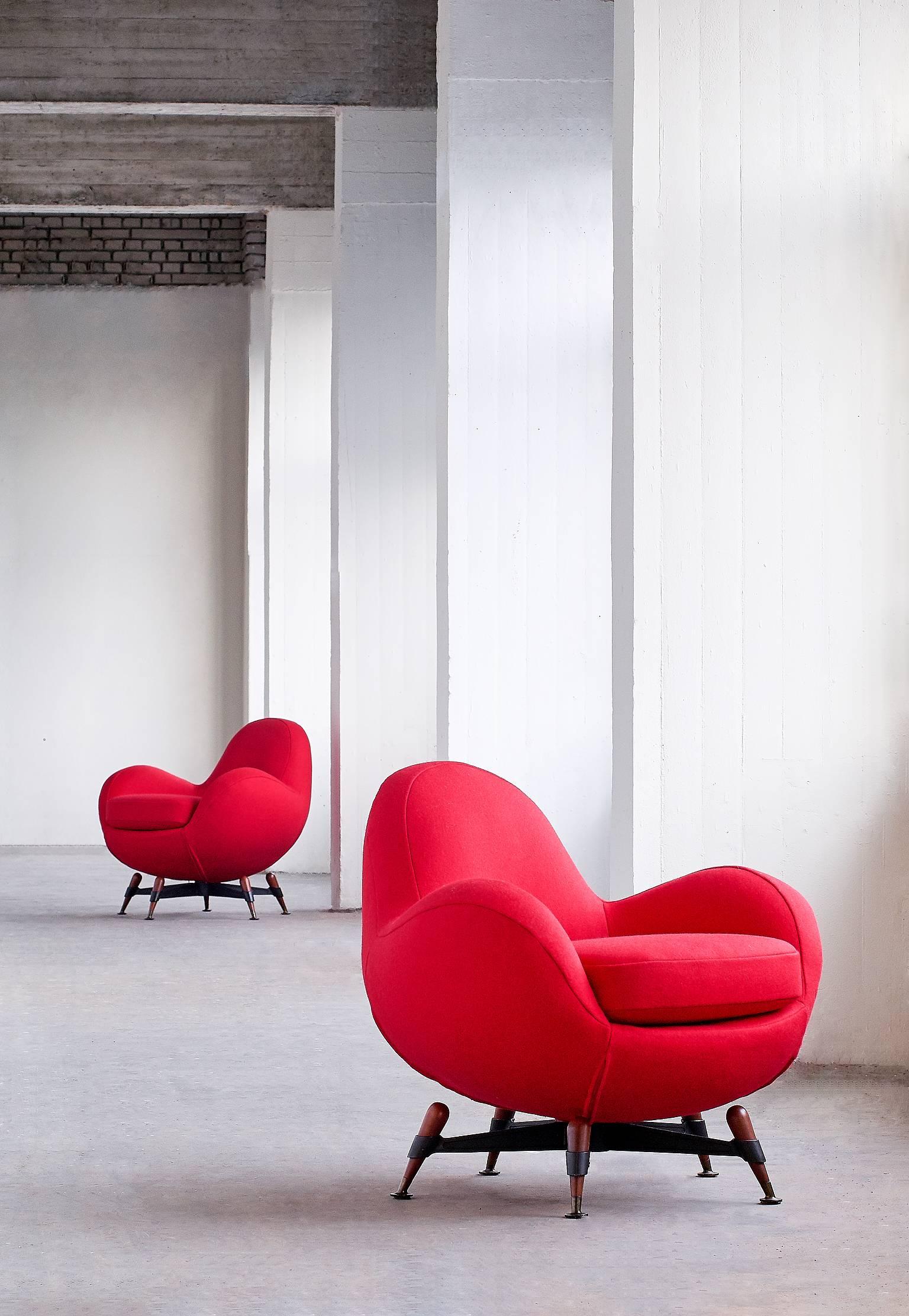 This exceptionally rare pair of swivel lounge chairs was designed by Rito Valla in 1963. This model named 'Mercury' was produced by IPE in Bologna for only a limited period of time in the mid 1960s. 
The design is characterized by the playful,