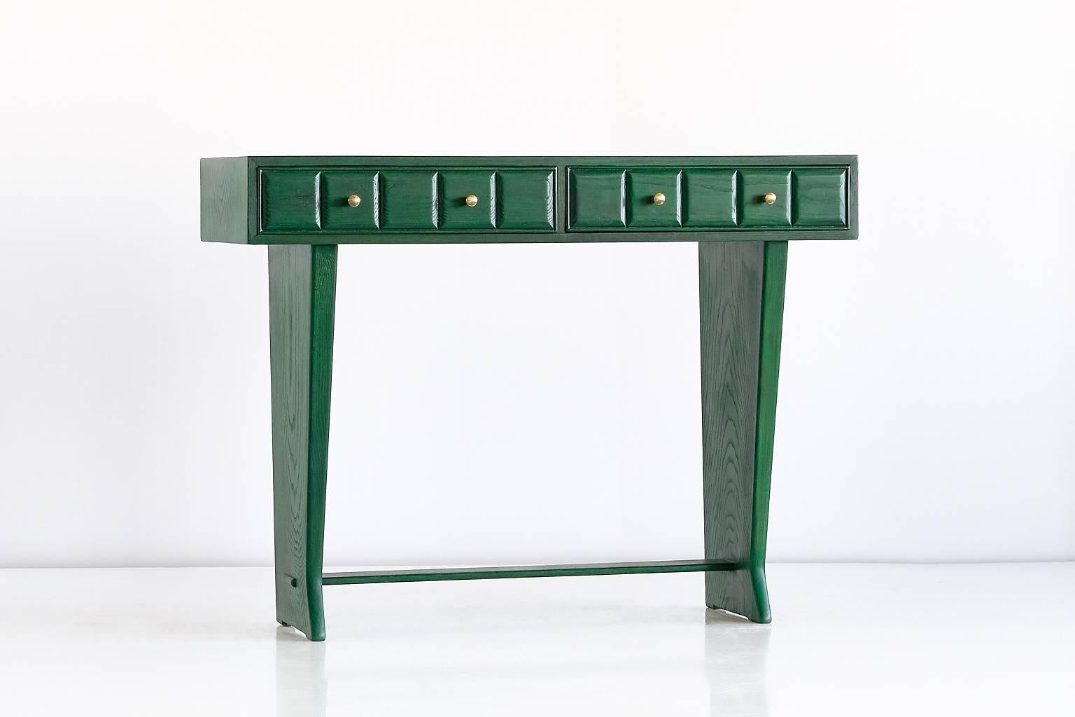 This green console was custom designed for a private palazzo residence in Florence. Made in the late 1930s, it was part of a dining room which had an entirely green decor. 
The console table is executed in solid elm and oak wood, with two panelled