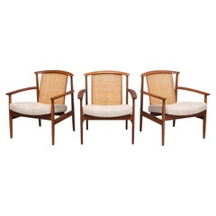 Three Folke Ohlsson 'Dallas' Armchairs in Teak and Cane, DUX, Sweden, 1960s