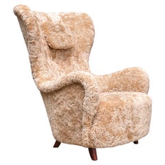 Sten Blomberg Wingback Chair in Honey Sheepskin, Knut Lindquist, Sweden, 1940s