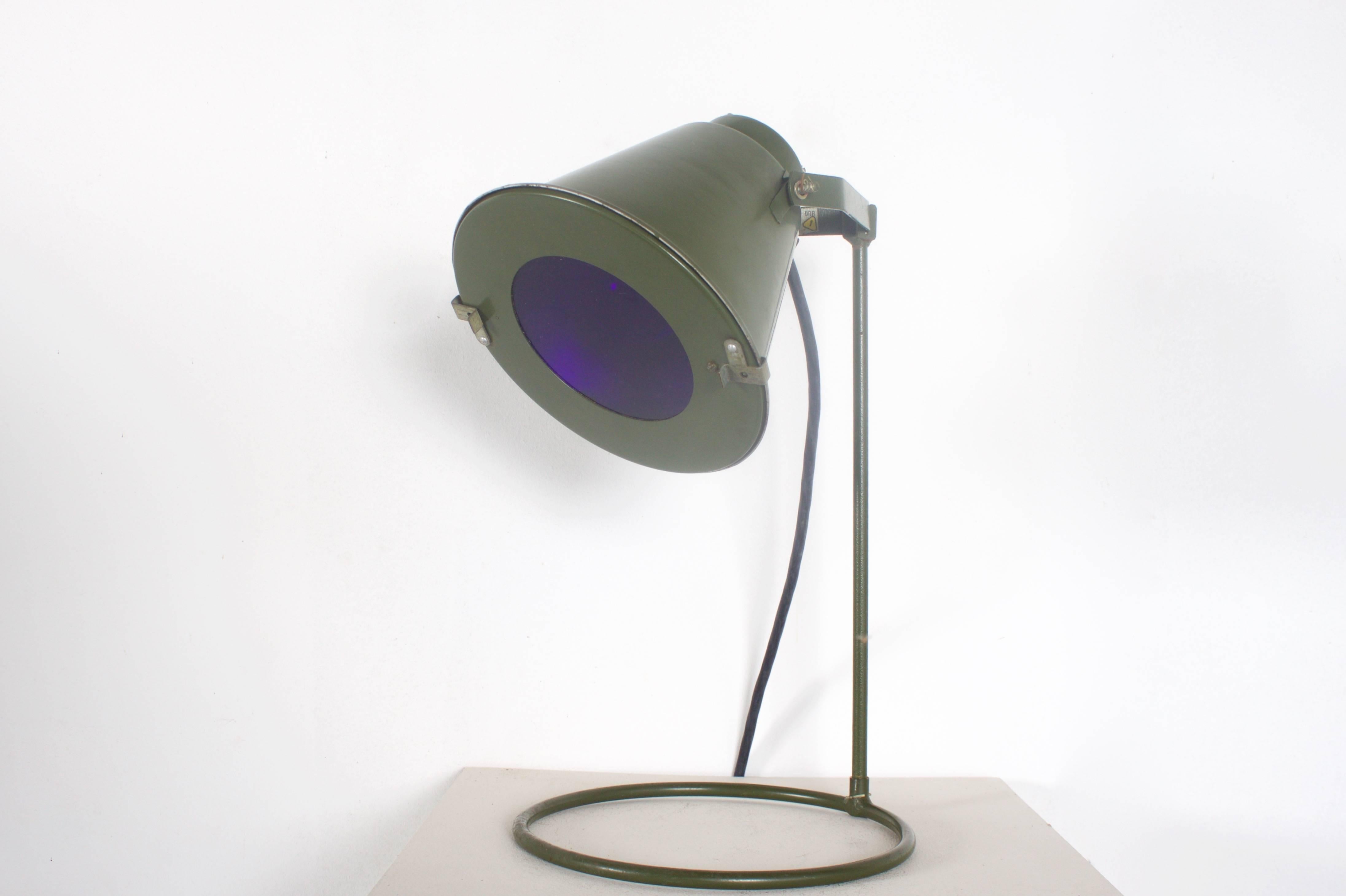 Rare DDR landing lamp used by the 'Nationale Volksarmee' (NVA) in the 1970s.

Four items available.

The lamp can be used as a desk or table lamp.

It comes with the original blue lens and an additional lens in clear glass. 

The aluminium