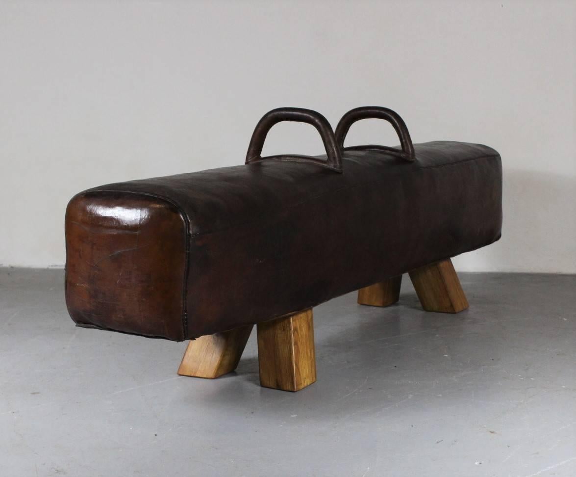 Leather gym pommel horse with handles from the 1930s. Good original condition with nice patina.