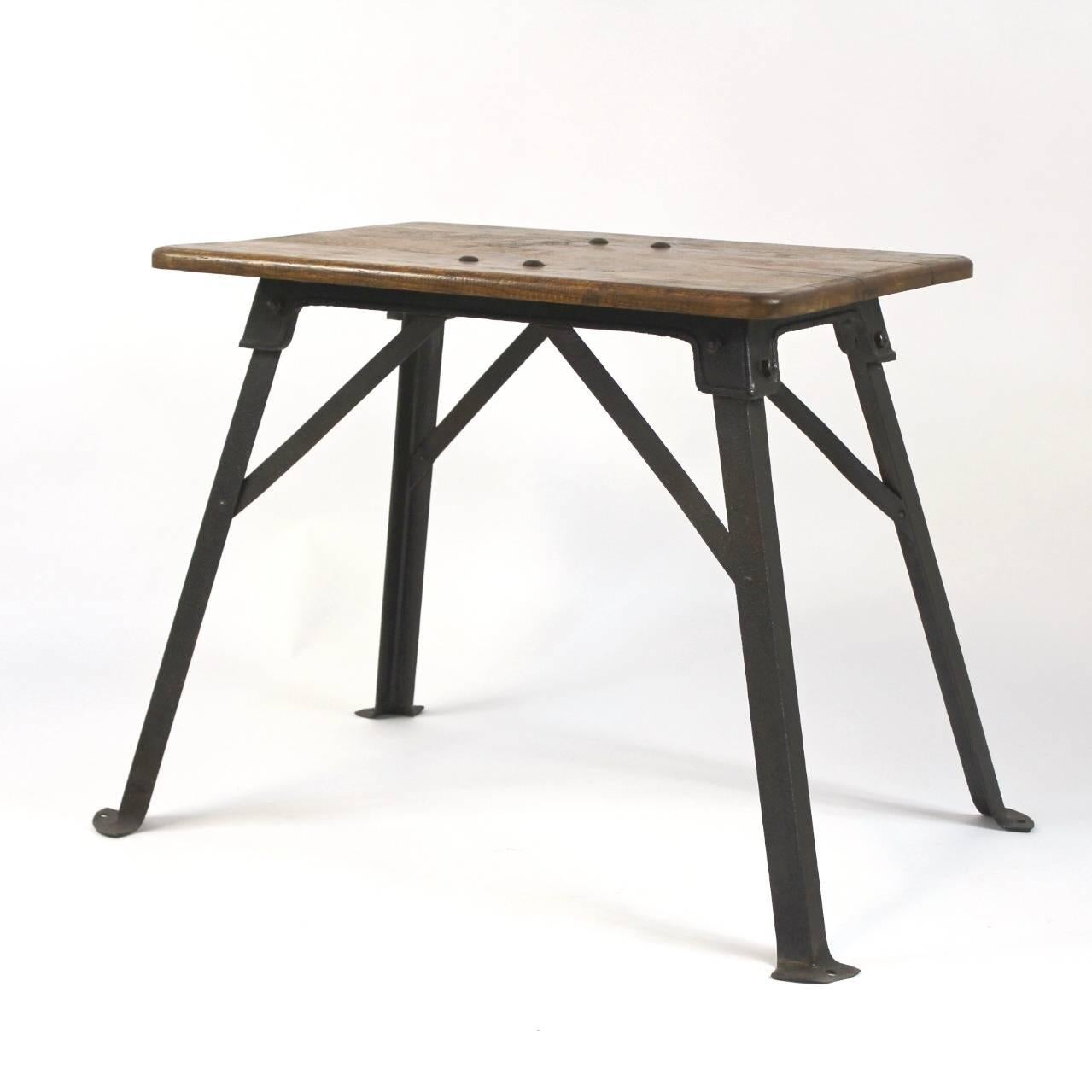 Industrial side table made from iron and solid oakwood. 

Measurements of a tabletop: 82cm x 60cm.