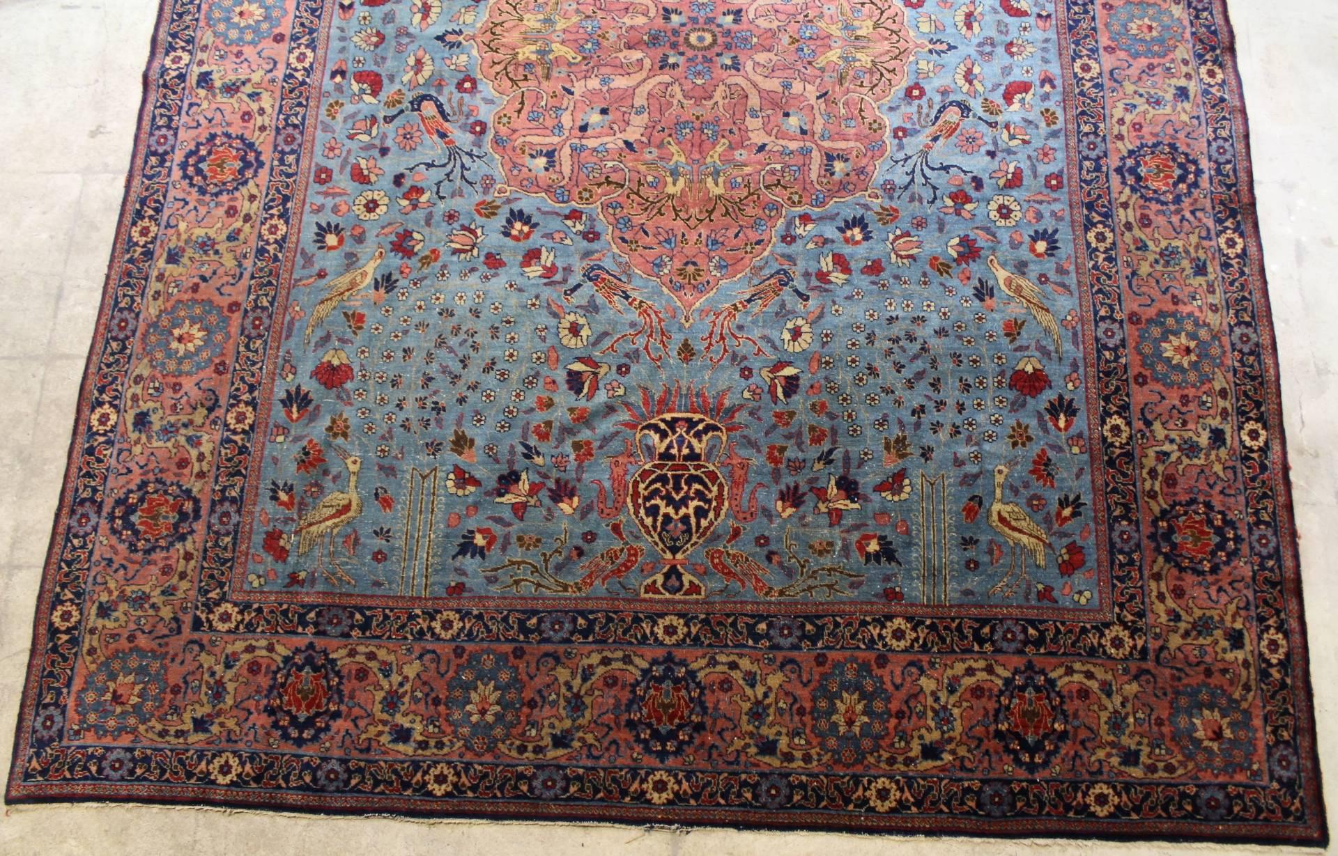 Large shiny Tabriz carpet with animal themes and attractive colours. The carpet is in its very good original condition without repairs and has been professionally cleaned.