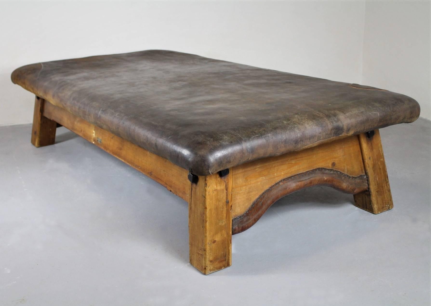 Rare leather gym table made in the middle of the19th century by J. Plaschkowitz in Vienna, Austria. The Plaschkowitz factory was founded in 1848. This gym table is no six of the series produced. It is built in a simple but solid way, joined by big