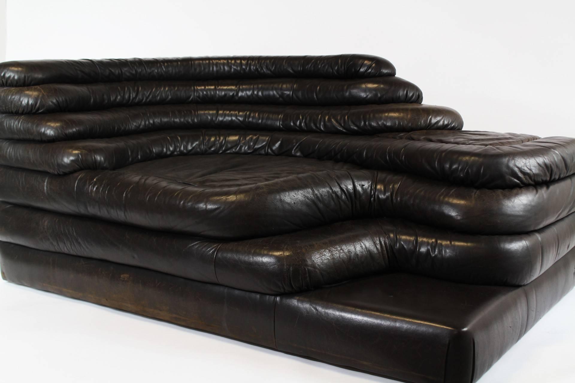 De Sede sofa nr. DS-1025 "Terrazza Landscape" designed by Ubald Klug. The sofa is in original, worn, chocolate dark brown leather. It was made in the 1970s. It is in good original vintage condition with some signs of use.
