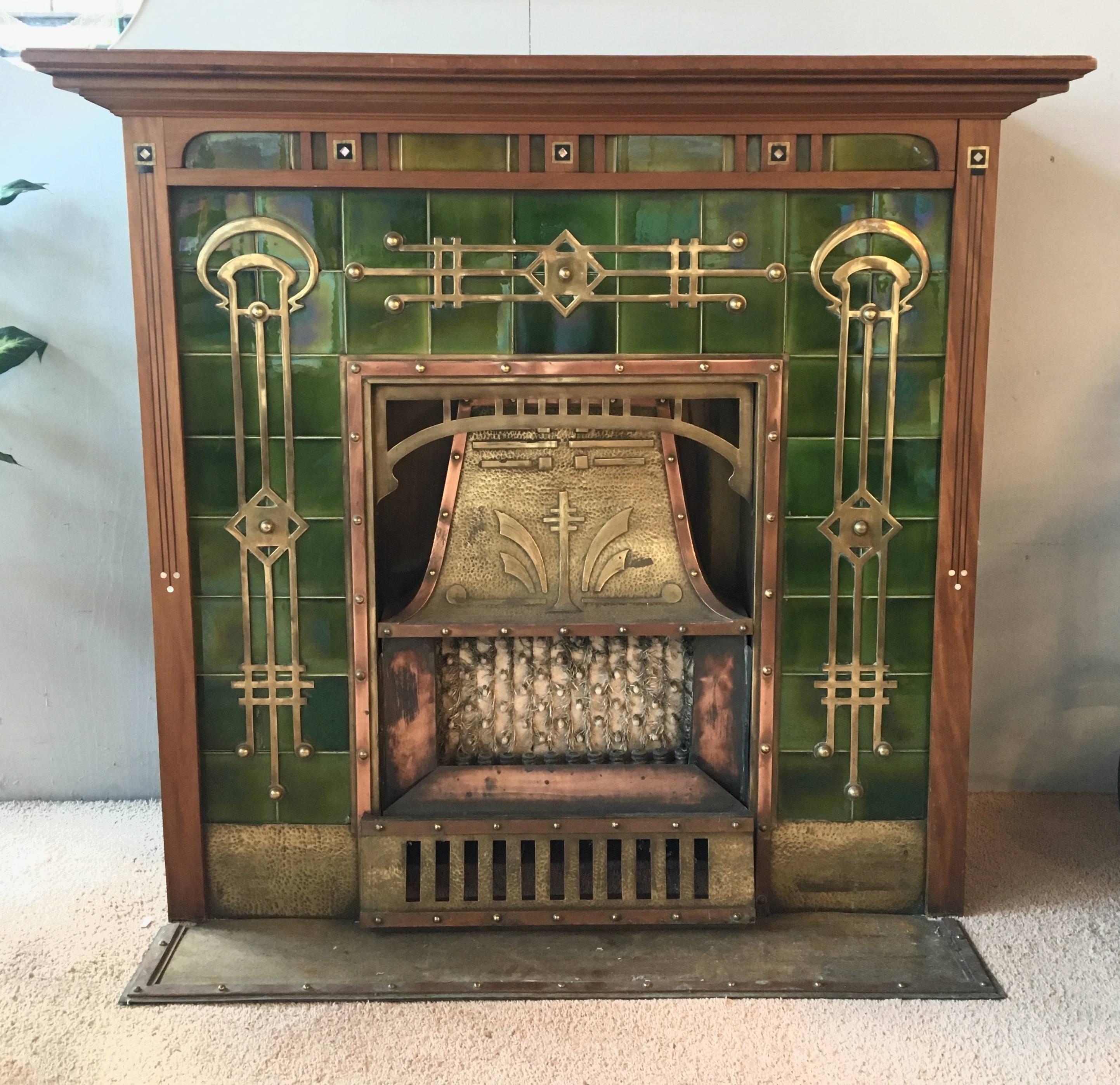 This wonderful Art Deco fireplace comes from an old mansion in Haarlem, The Netherlands. Most likely a design of the Dutch furniture and copper company 'Onder den St. Maarten'', which was founded in Zaltbommel by architectural engineer J.A. Pool