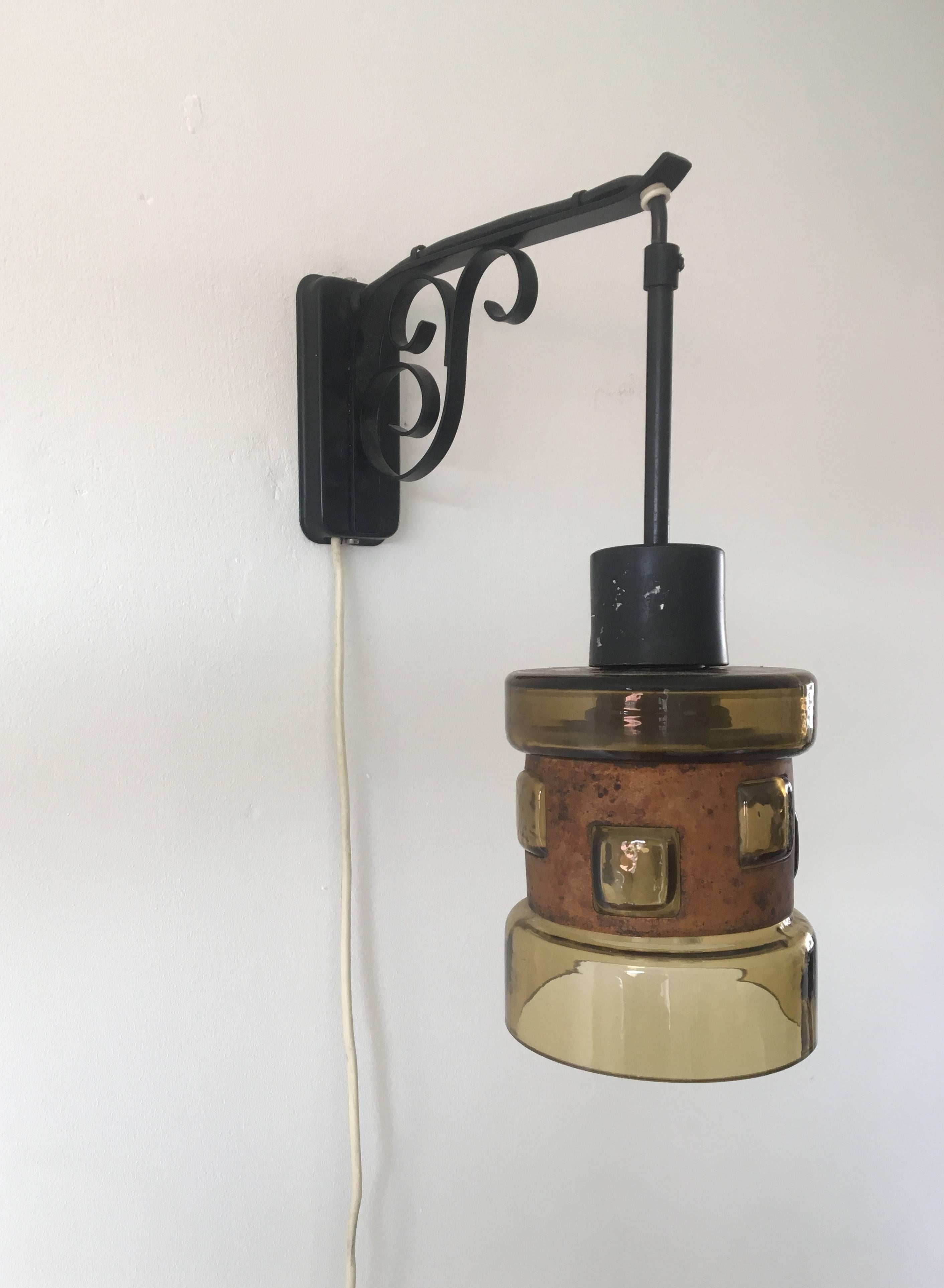 Wonderful lantern hanging on a romantic black lacquered metal base. Typical Nanny still design with copper details. Minor wear and European wiring.