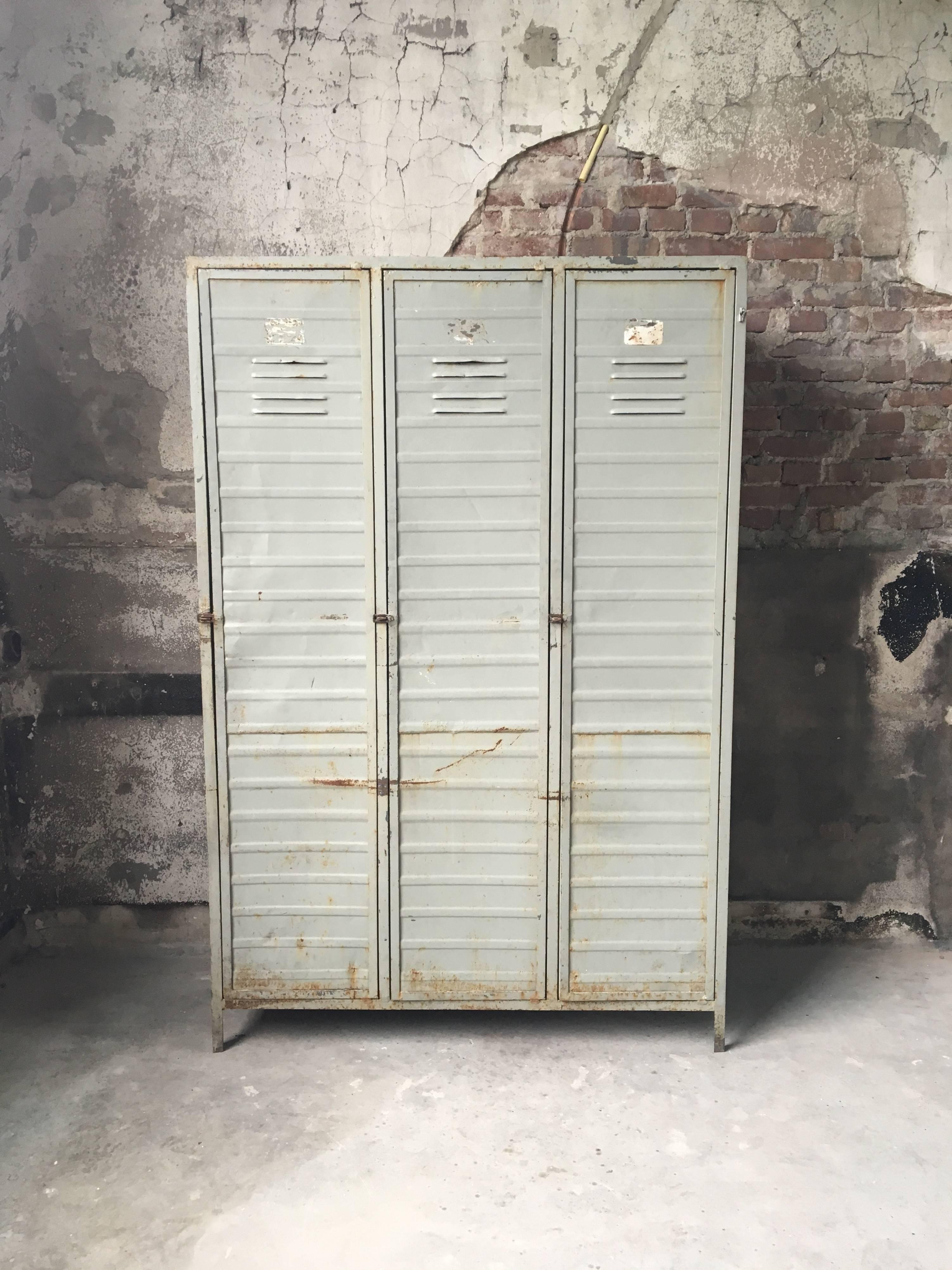 Vintage Industrial cabinet with magnificent patina! Wear consistent with age and use.