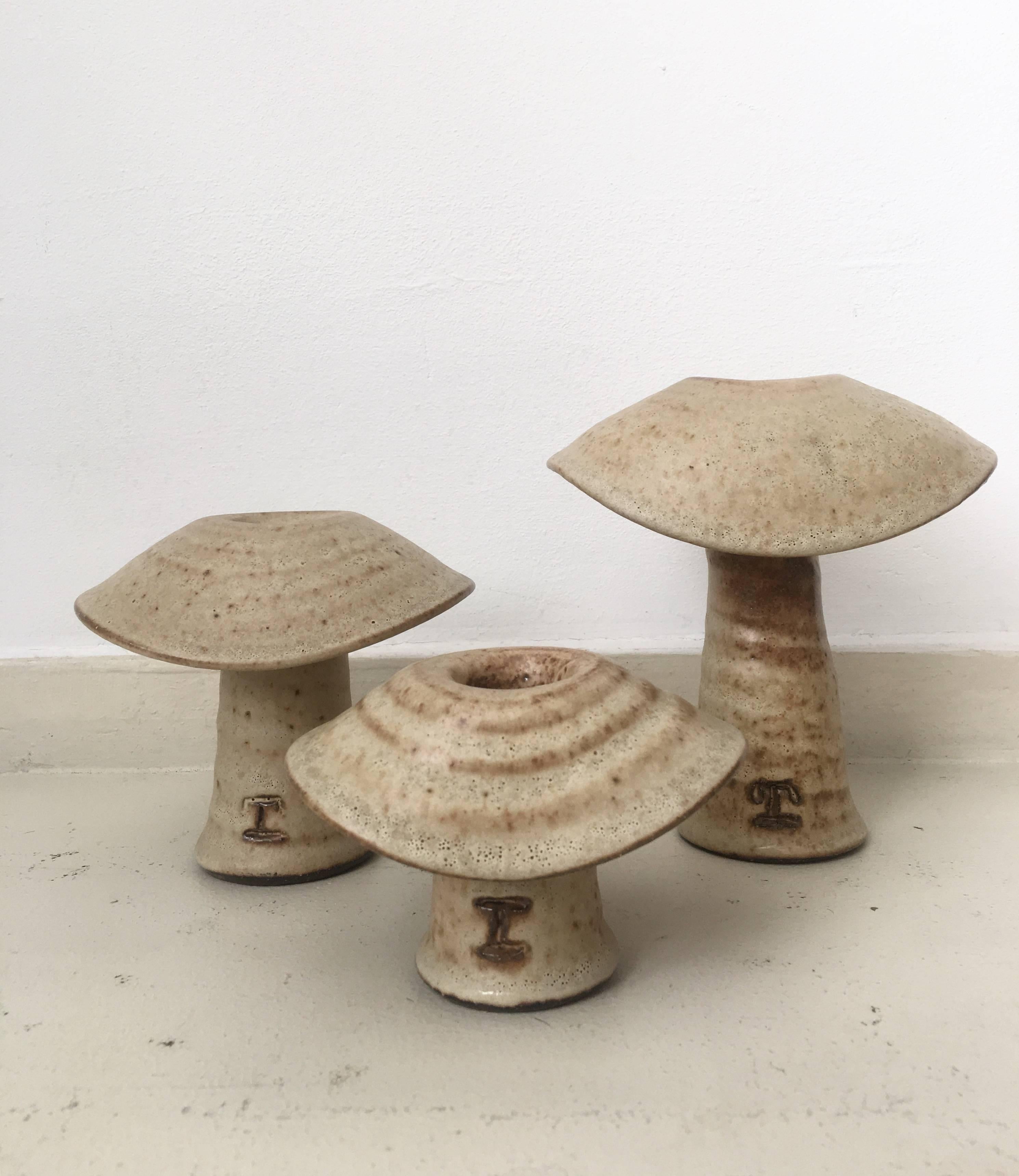 These mushroom like ceramic sculptures were created by the Dutch Ceramist Freek Berends in 1985. They were most likely created for decorative purpose but can also be used as small vases. They all feature some kind of stamp to the front and they were