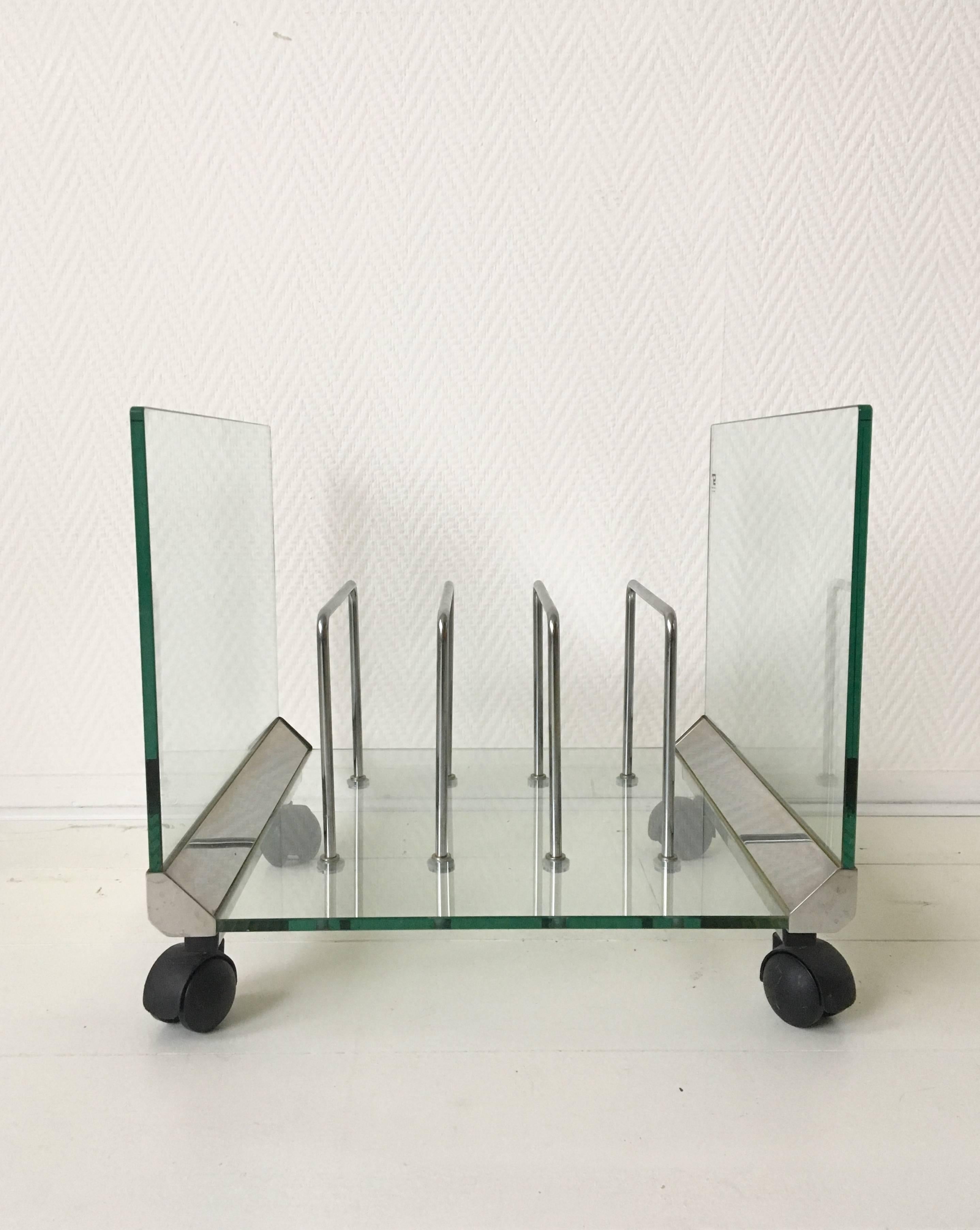 This exclusive rack was designed and manufactured by Galotti and Radice Italy. It features a thick glass 'body' with stainless steel elements. This piece remains in excellent condition and holds the manufacturer's sticker.