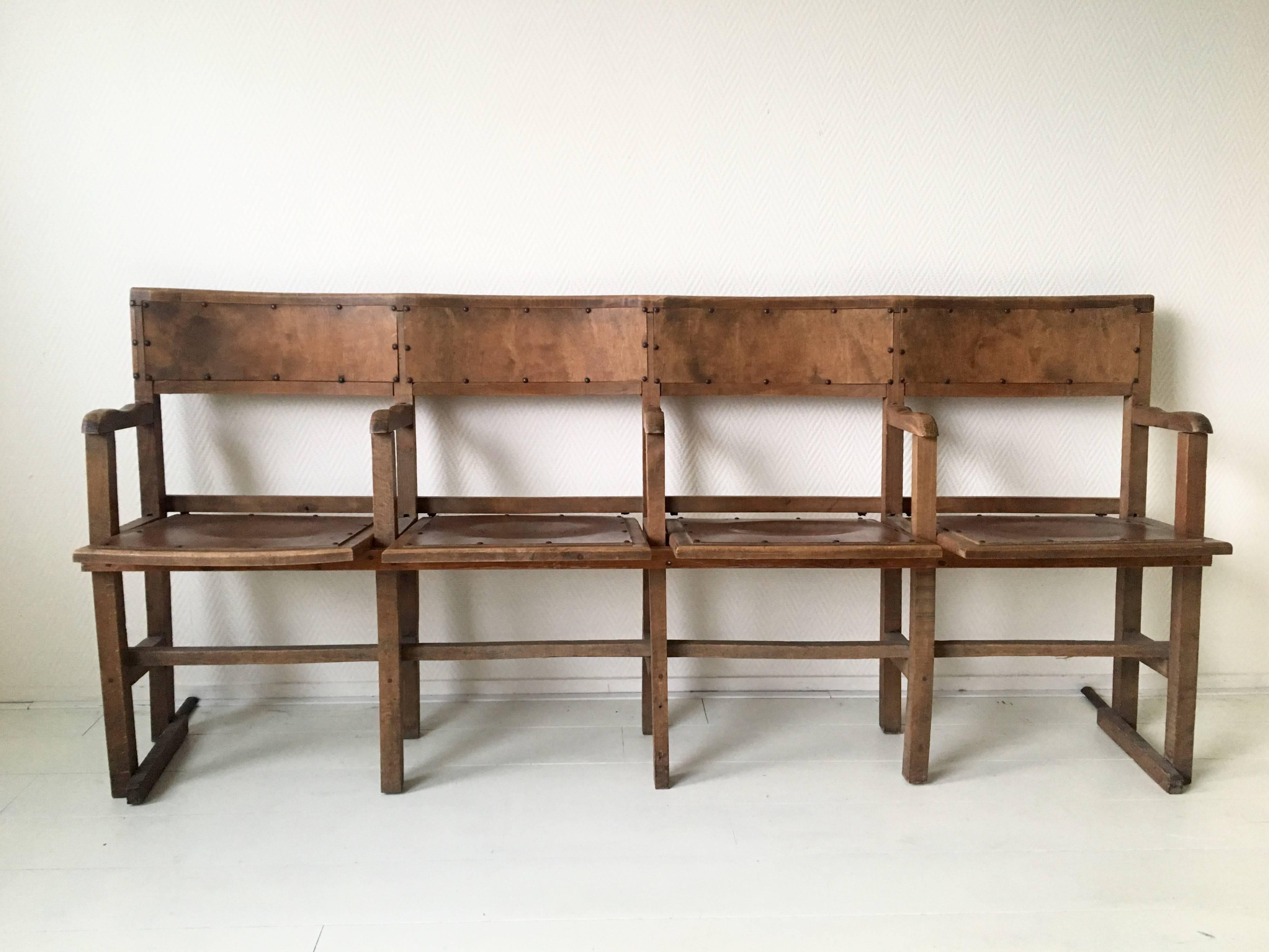 This Industrial bench was made from wood or plywood. It features elegant imprinting’s on the seating’s which are adjusted to the frame with nails. This bench is in good and completely original condition with some signs of age and use. Also some old