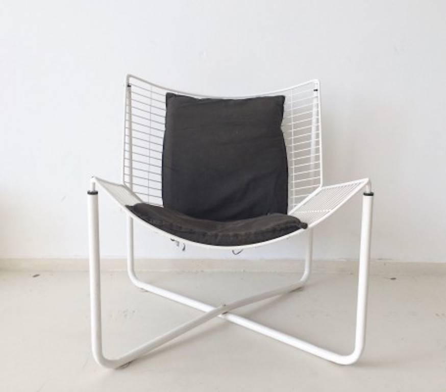 This lounge chair or easy chair was designed by Niels Gammelgaard for Ikea, and produced in 1983. The frame is made of white lacquered metal and comes with the original fabric seat and backrest cushions. 

The chair remains in a very good vintage