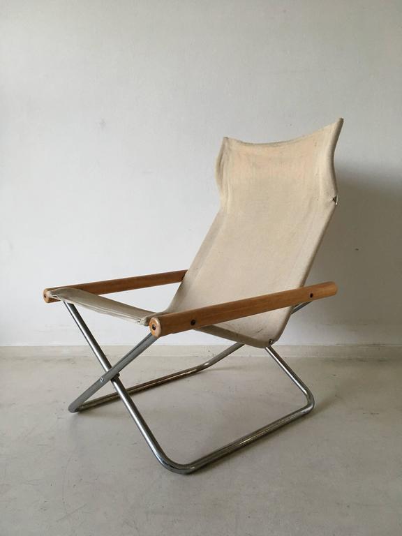 This foldable lounge chair was designed by Japanese designer Takeshi Nii in 1958. The chair was named 'NY' after the designer's family name, meaning 'new' in Danish. This chair has won may awards and became a permanent feature in the MOMA collection