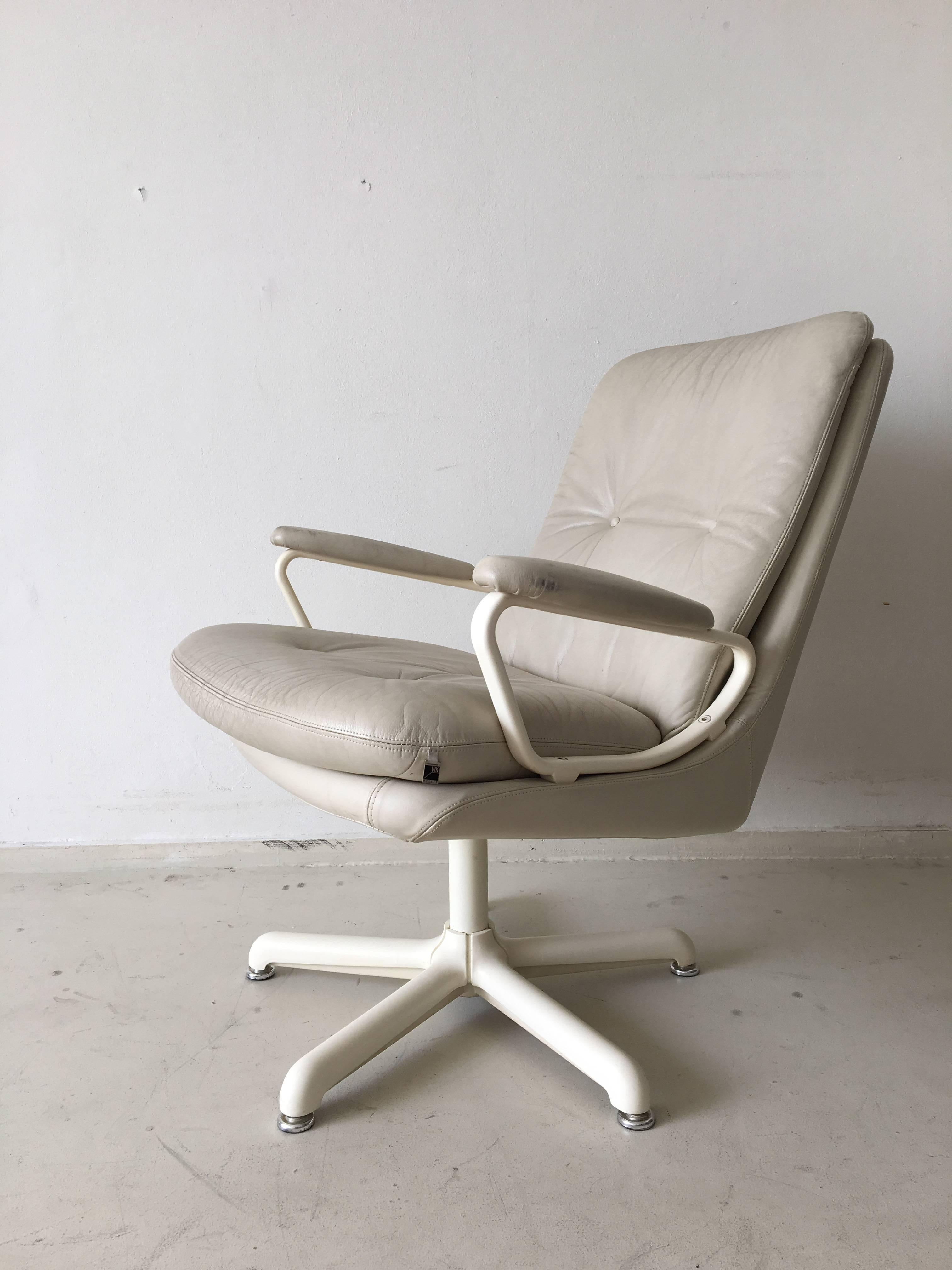 Great design manufactured in Germany, circa 1960s. This model looks very similar with the 'Gentilina' chair from Strässle which was designed by André Vandenbeuck. The chair remains in sturdy condition with wear (no tears, see photos). Very