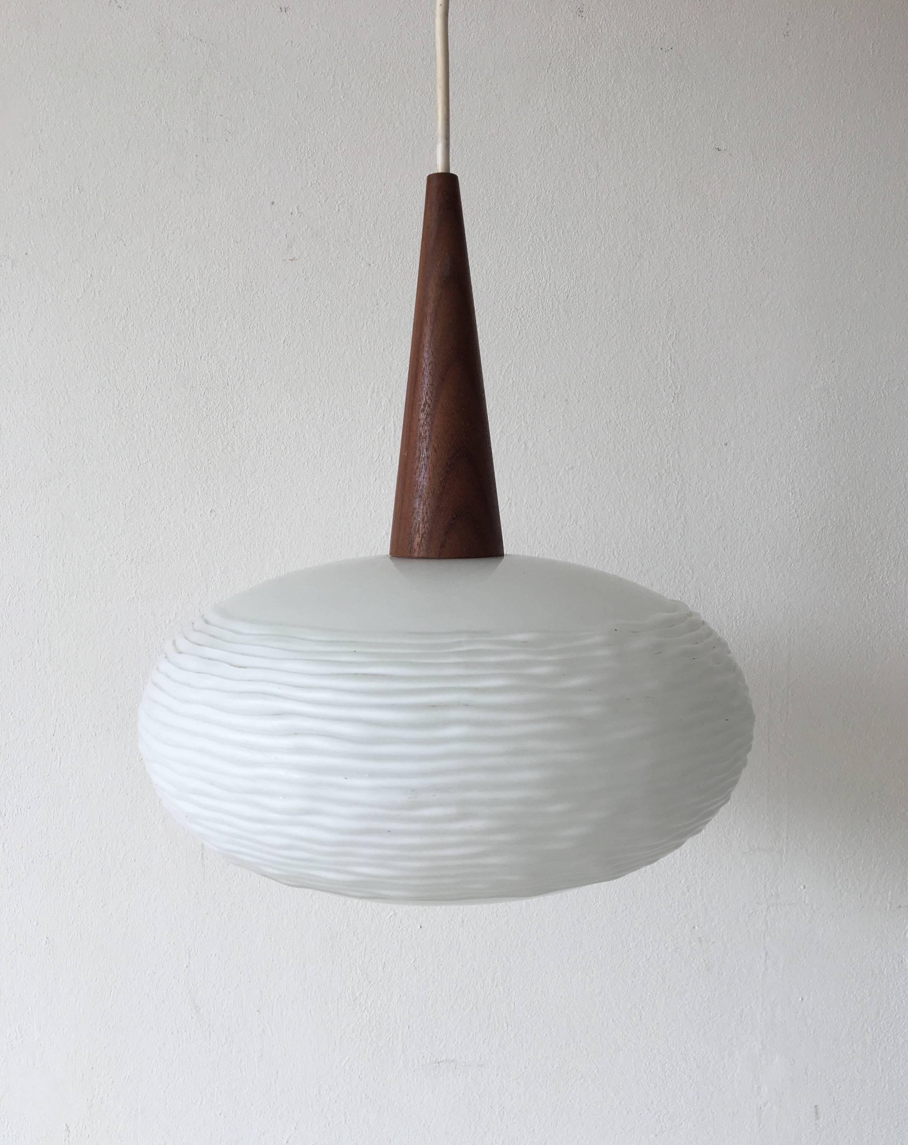 Dutch Opaline Glass and Teak Pendent Lamp by Louis Kalff for Philips, 1960s For Sale