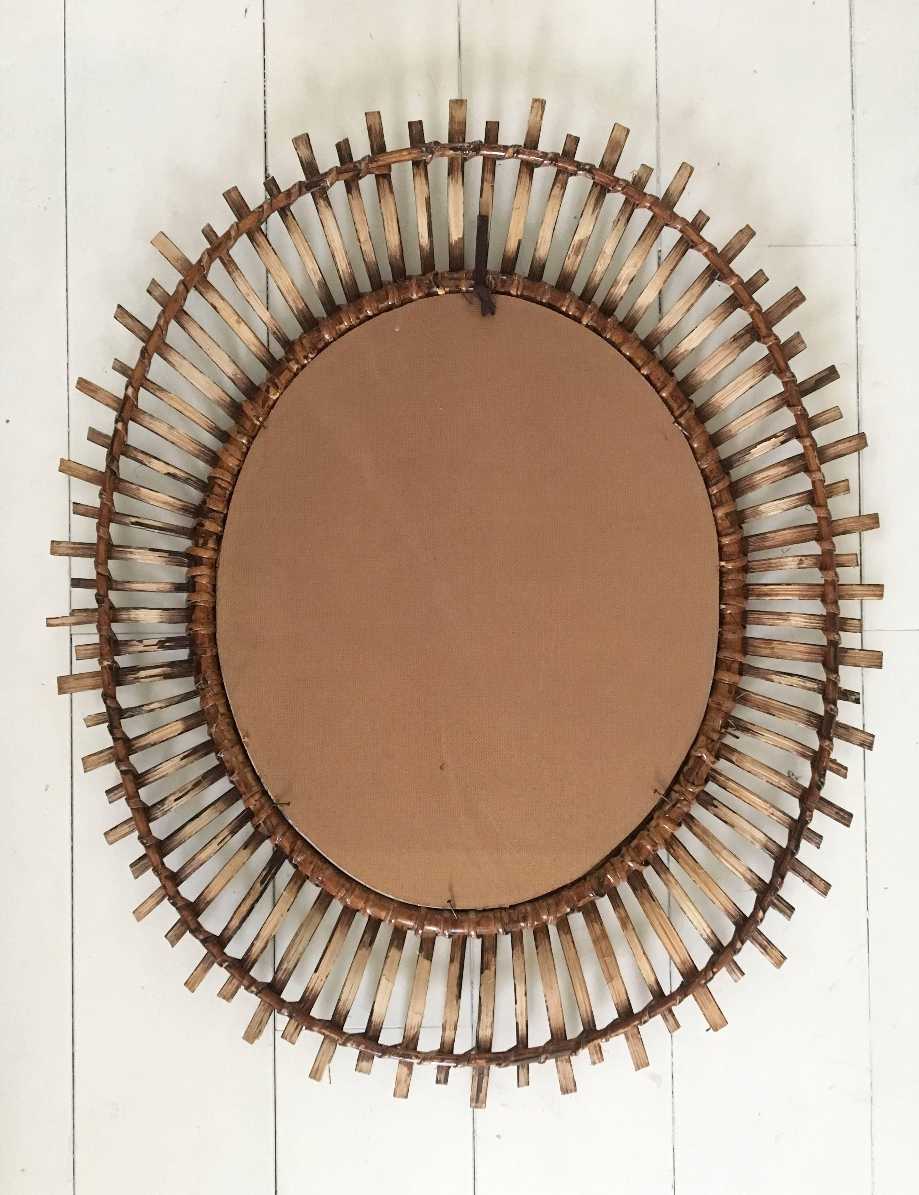 oval starburst mirror