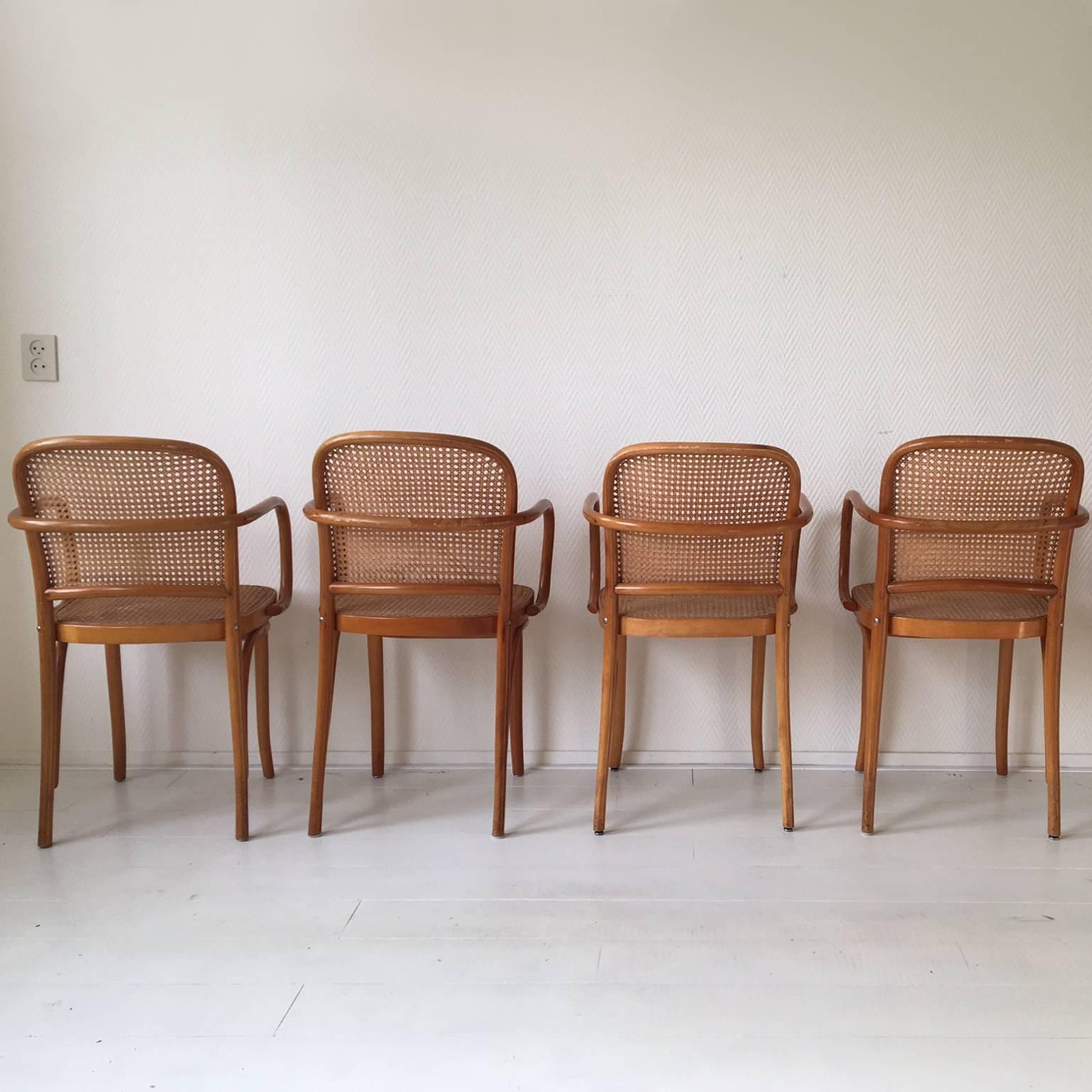 This set of four beautiful chairs was designed by Josef Hoffmann and produced in Romania, circa 1960s. They feature a bentwood frame and a cane seat and back.

They remain in a good vintage condition with minimal signs of age and use.