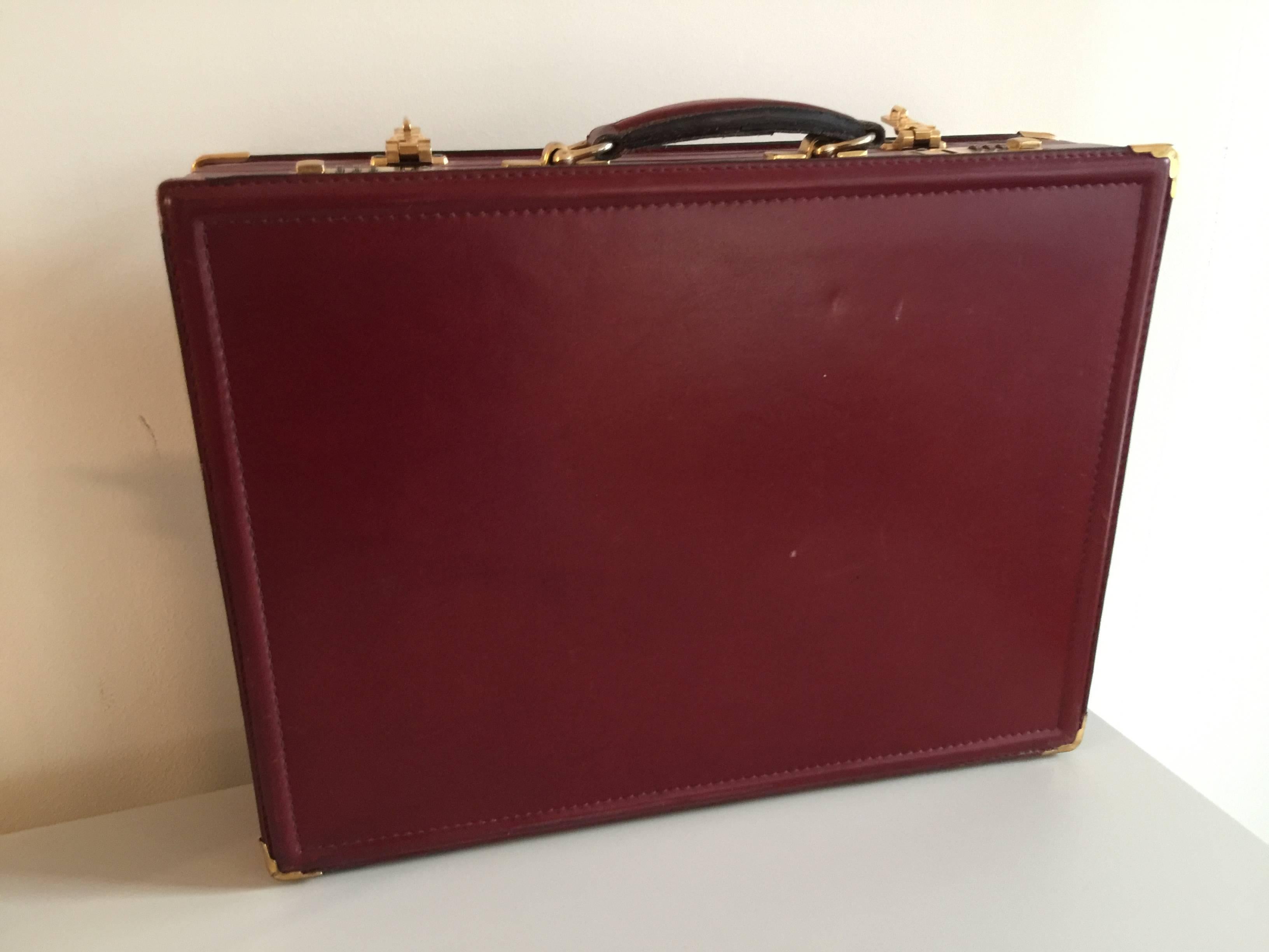 A rare set of two Nazareno Gabrielli made in Italy briefcases in red leather with beautiful inside compartments. Good conditions, used in our studio gallery as a decor piece. Functioning and opening, gold hardware . No keys no dustbag. True rare